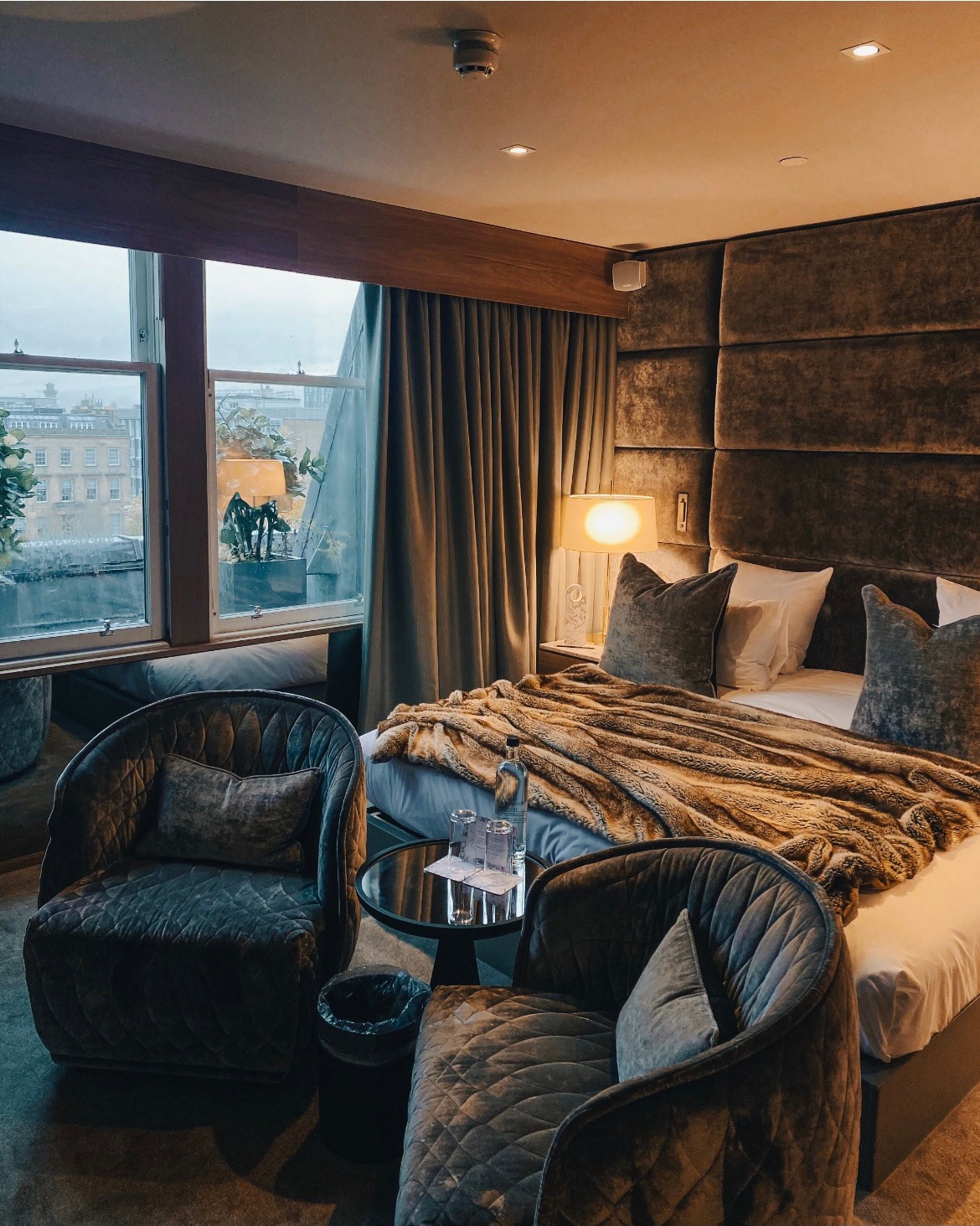 Luxurious Monte Carlo Suite with plush bedding, ideal for intimate meetings and retreats.
