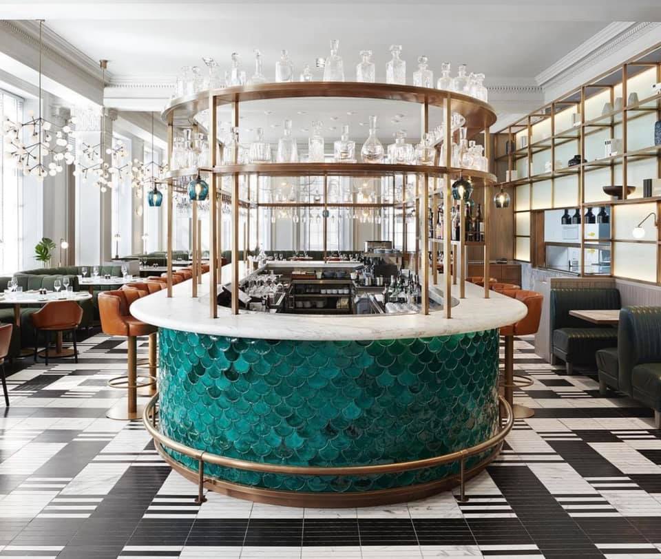 Monte Carlo Suite bar with turquoise mosaic, ideal for networking events and cocktail receptions.