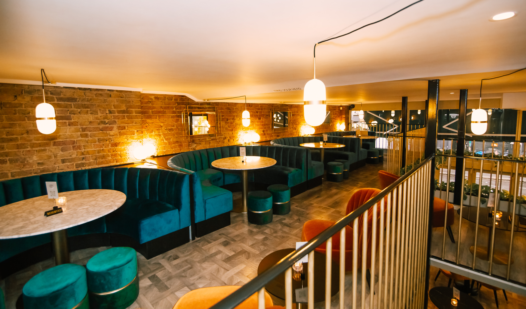 Stylish Luna Gin Bar with plush seating, perfect for intimate gatherings and networking events.