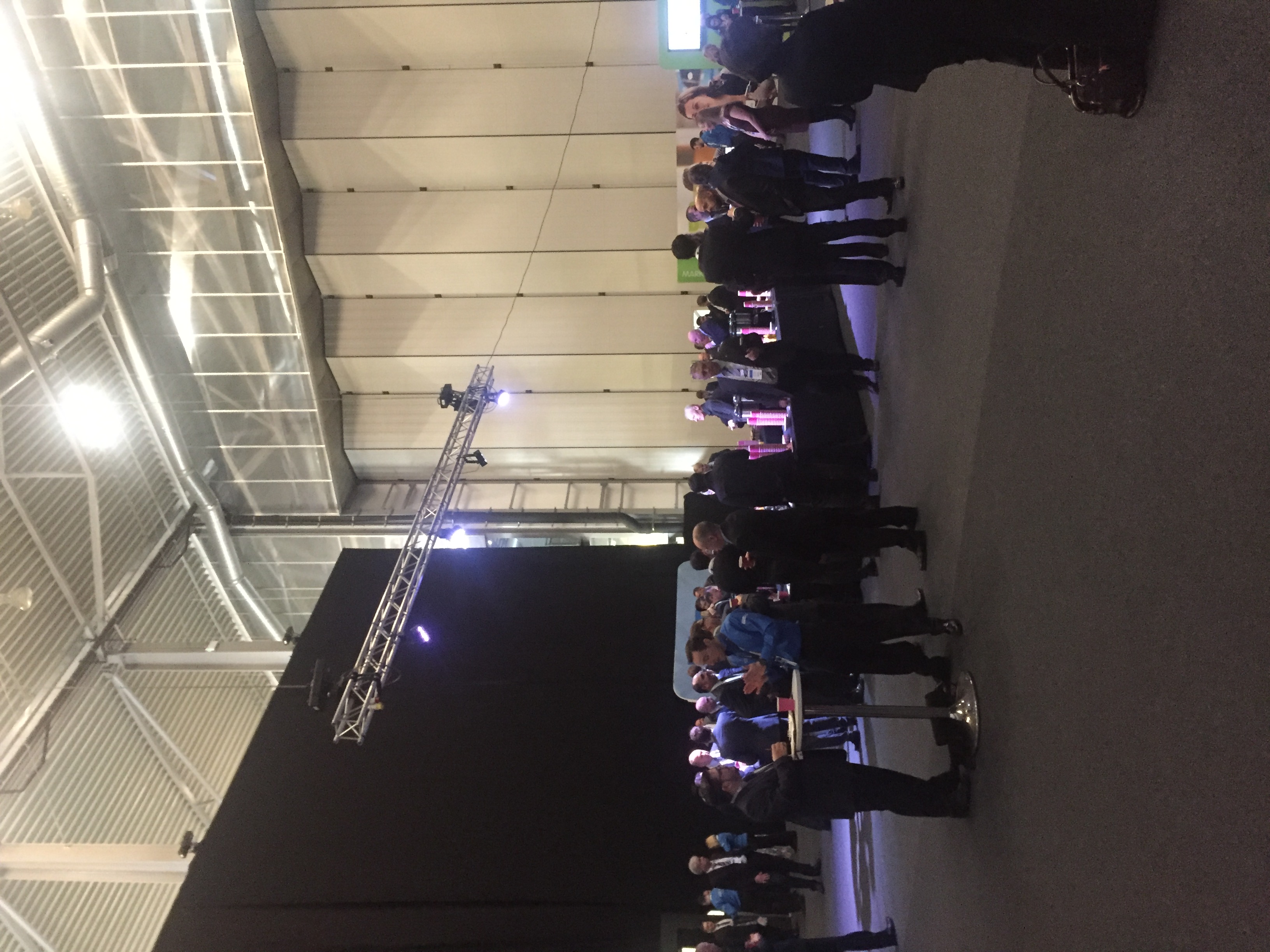 Networking event at Conservation Hall, IWM Duxford, featuring a spacious layout and refreshments.