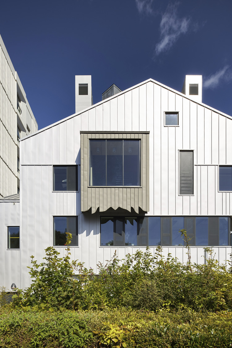 Modern Meeting Room at Contact Theatre with large windows for events and workshops.