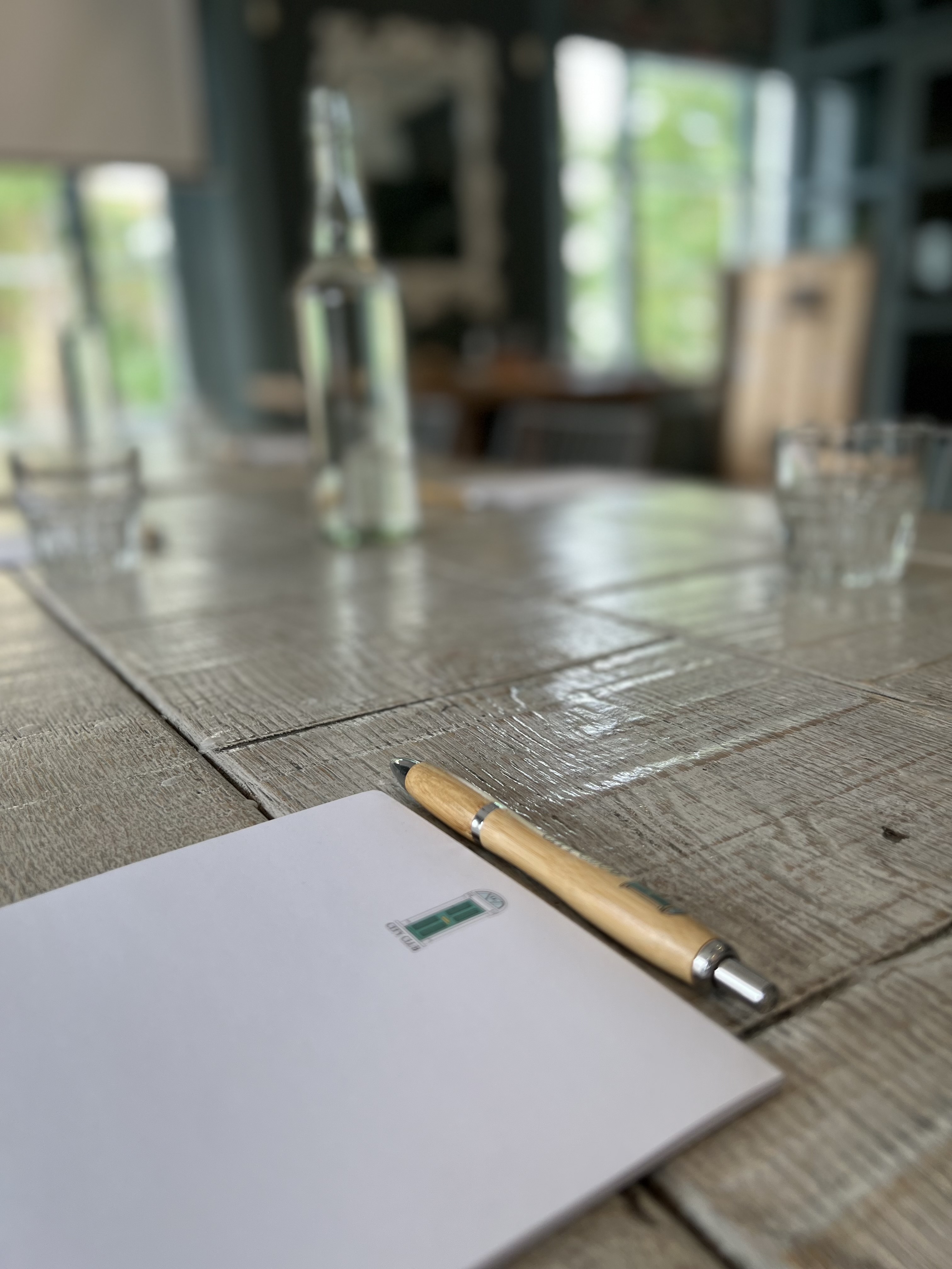 Meeting space at The Phene with wooden table, ideal for brainstorming events.