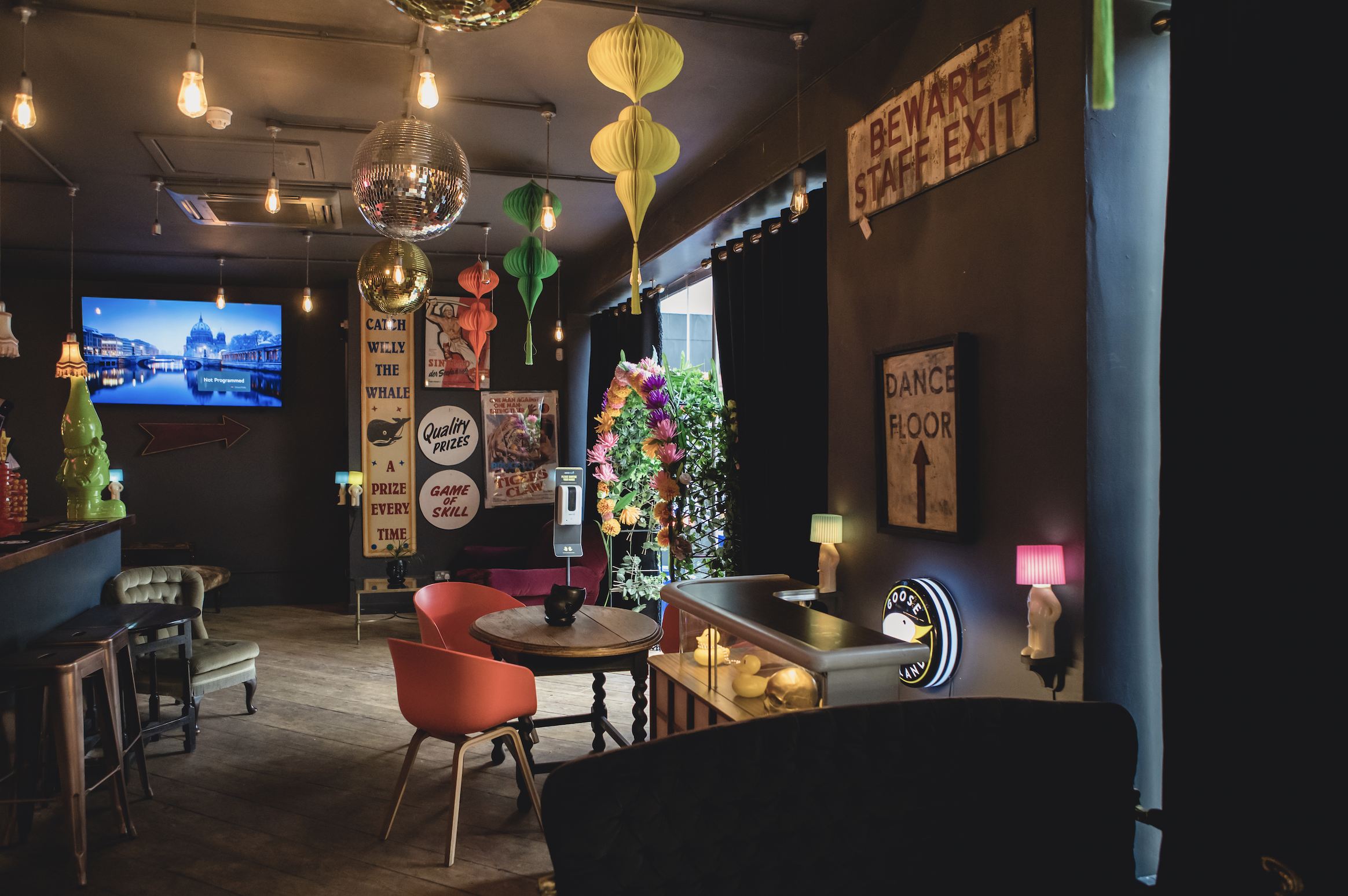 Vibrant Sobremesa Bar event space with colorful decor for networking and celebrations.