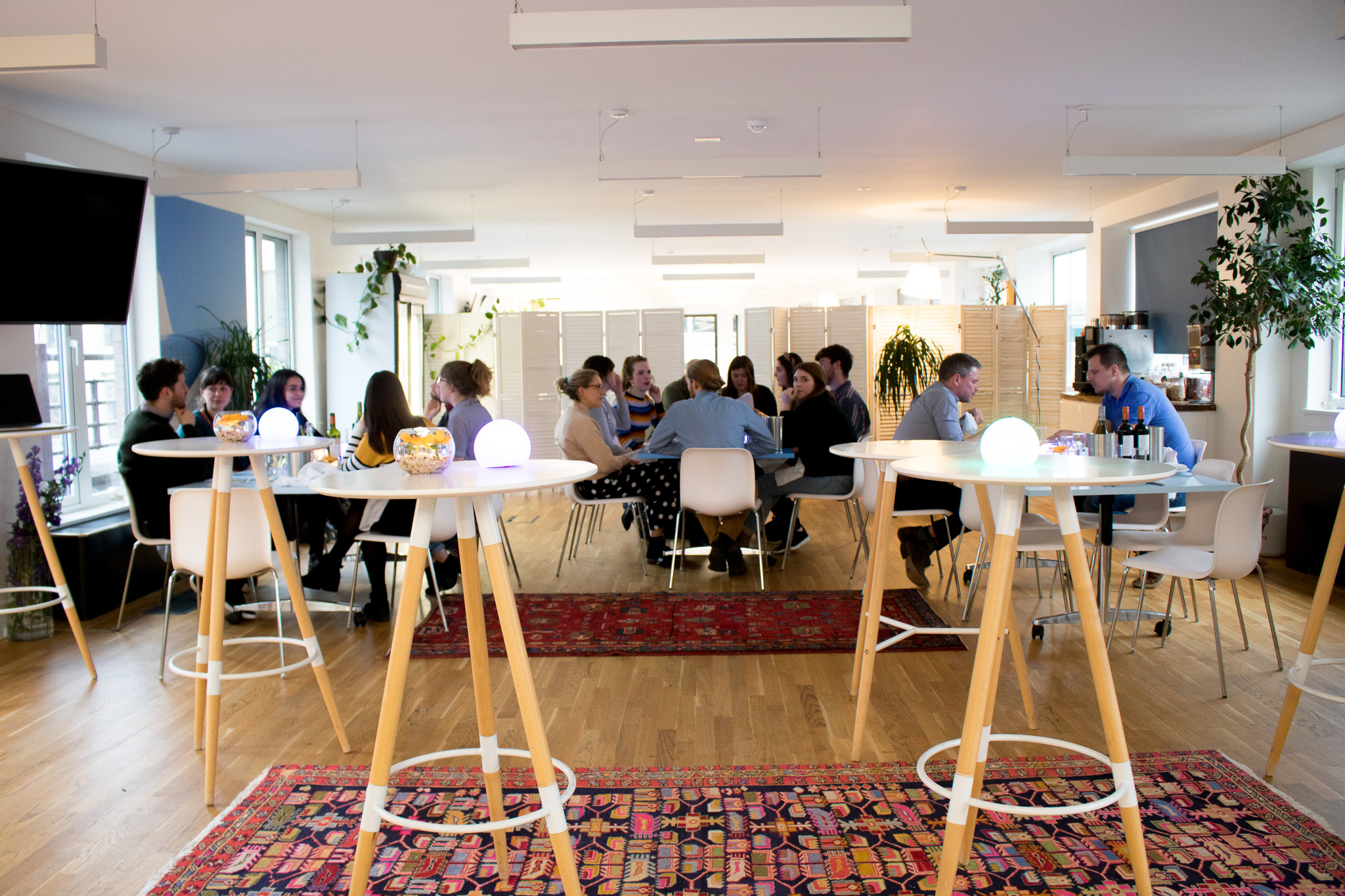 Rooftop Kitchen event space with plants, ideal for workshops and social gatherings.