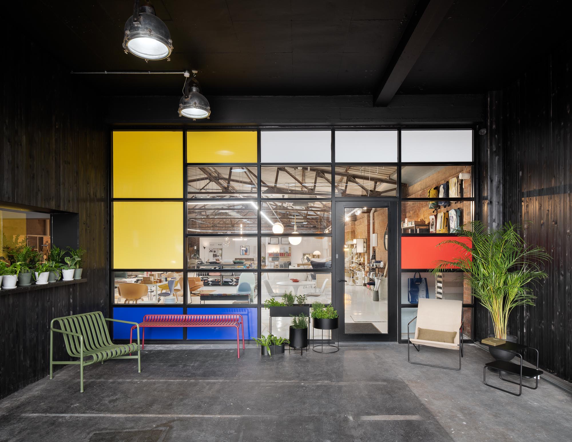 Modern event space at Central Warehouse with large windows, ideal for workshops and networking.