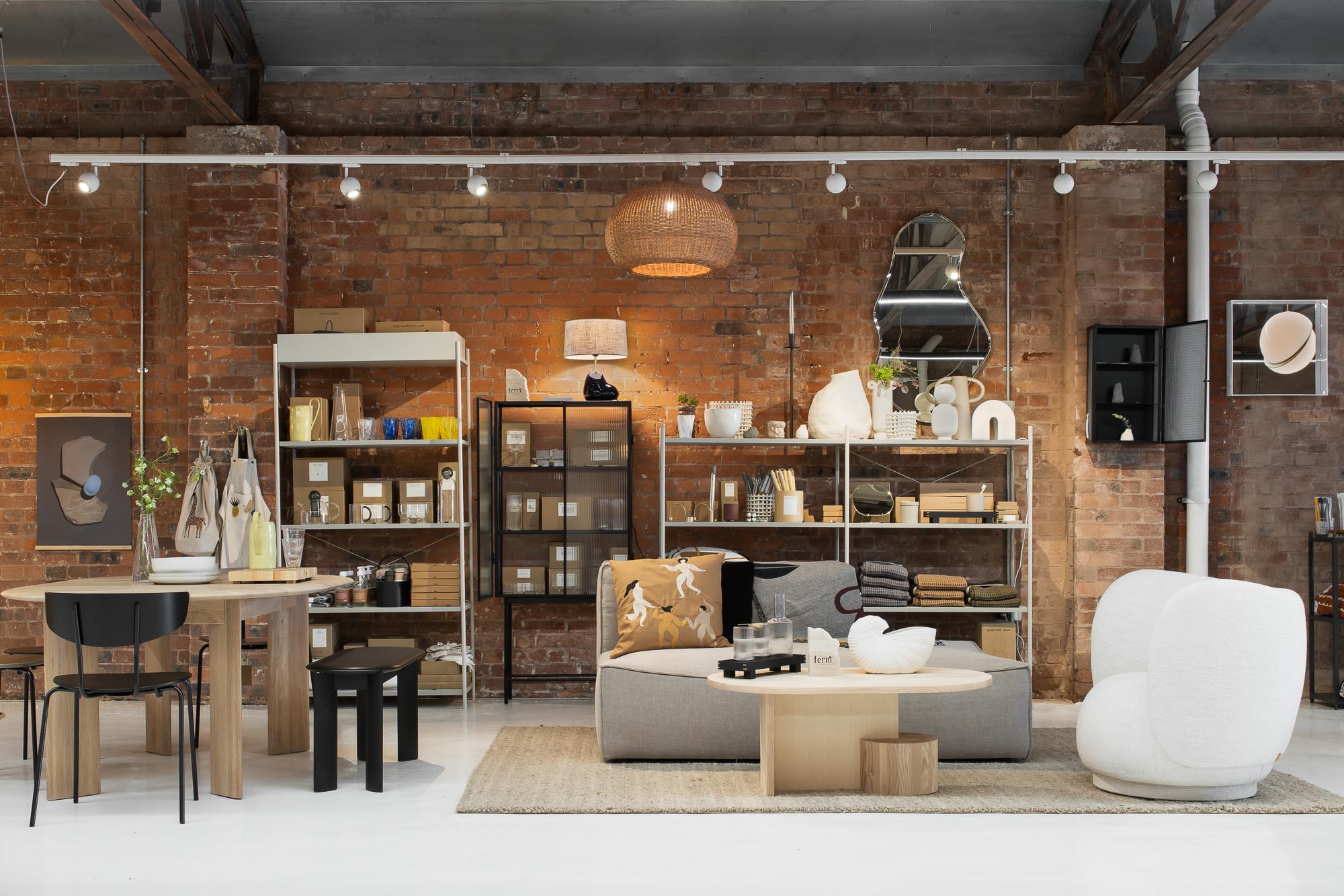 Stylish Central Warehouse event space with warm brick walls for networking and workshops.