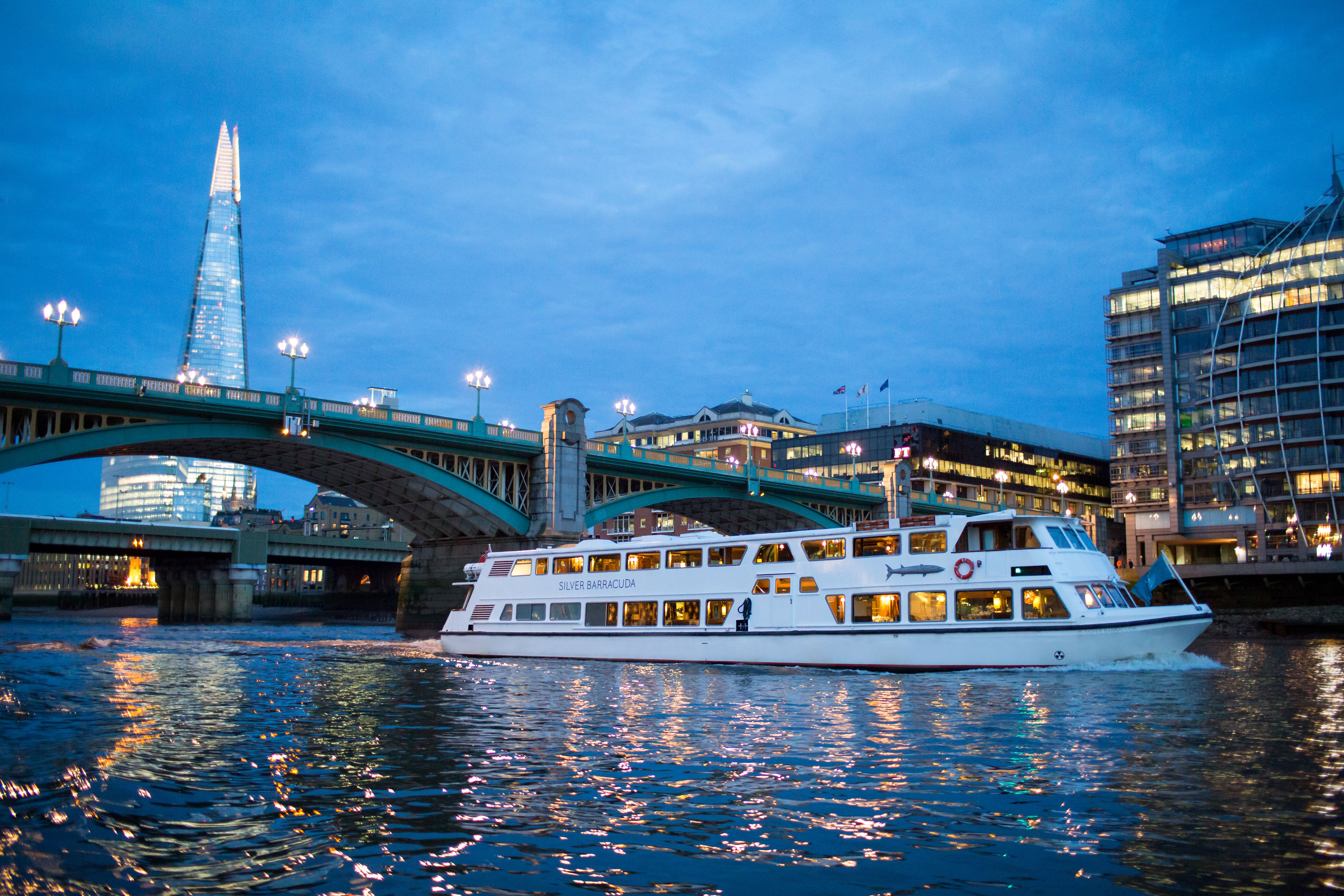 Sleek Silver Barracuda boat on Thames, ideal for corporate events and private parties.