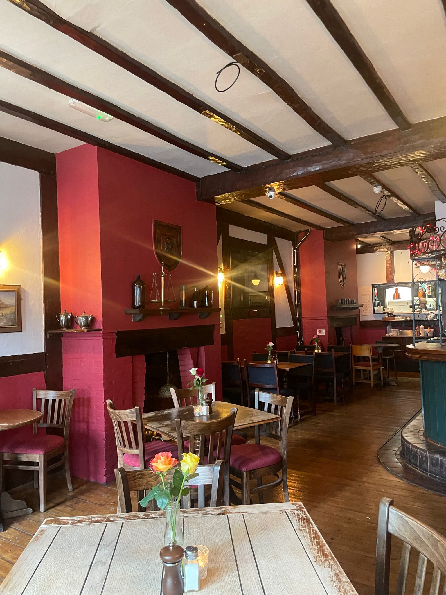 Cozy Red Room at The Old Red Lion, perfect for intimate meetings and events.