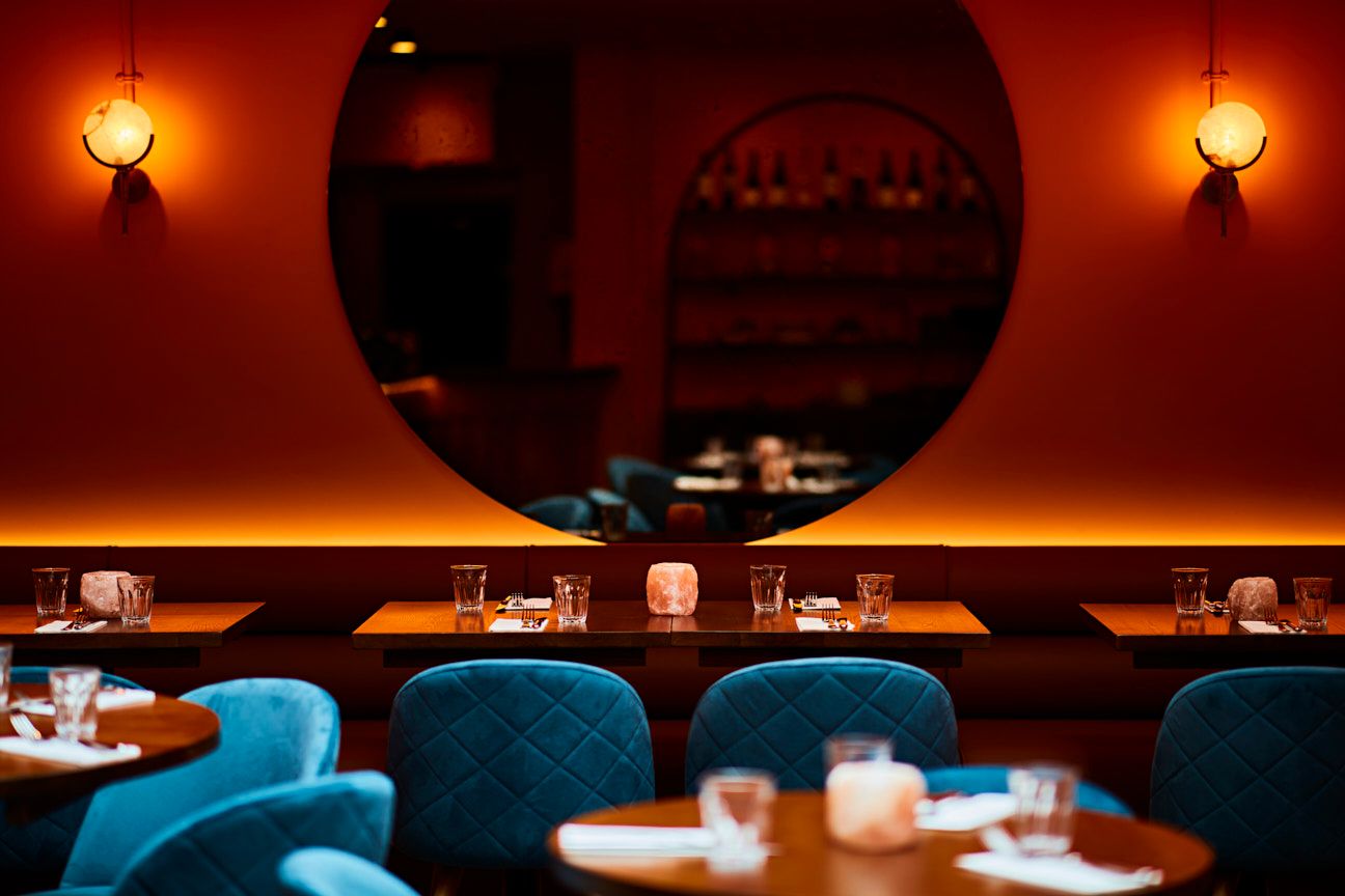 Lilly's Cafe: stylish restaurant with warm lighting, perfect for intimate gatherings and events.