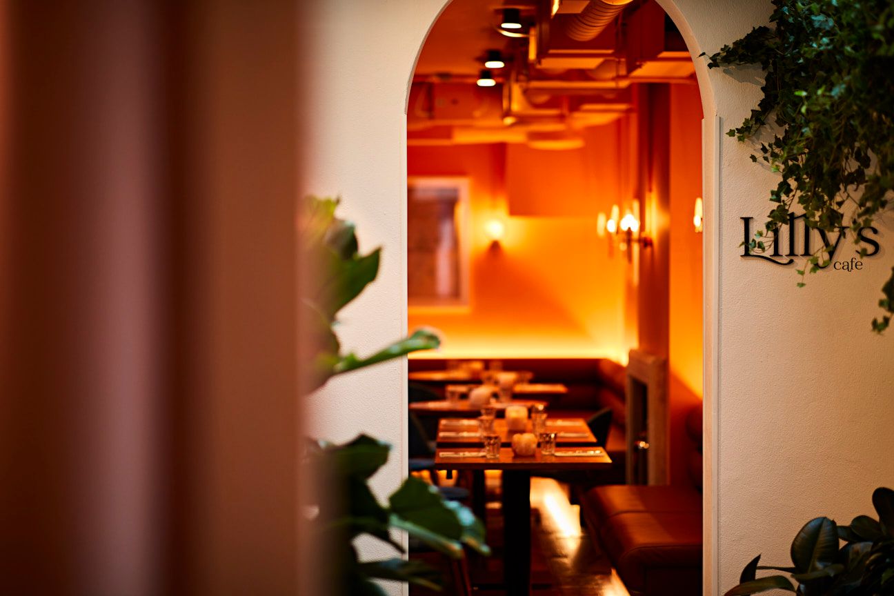 Lilly's Cafe: cozy restaurant with soft lighting for intimate gatherings and events.