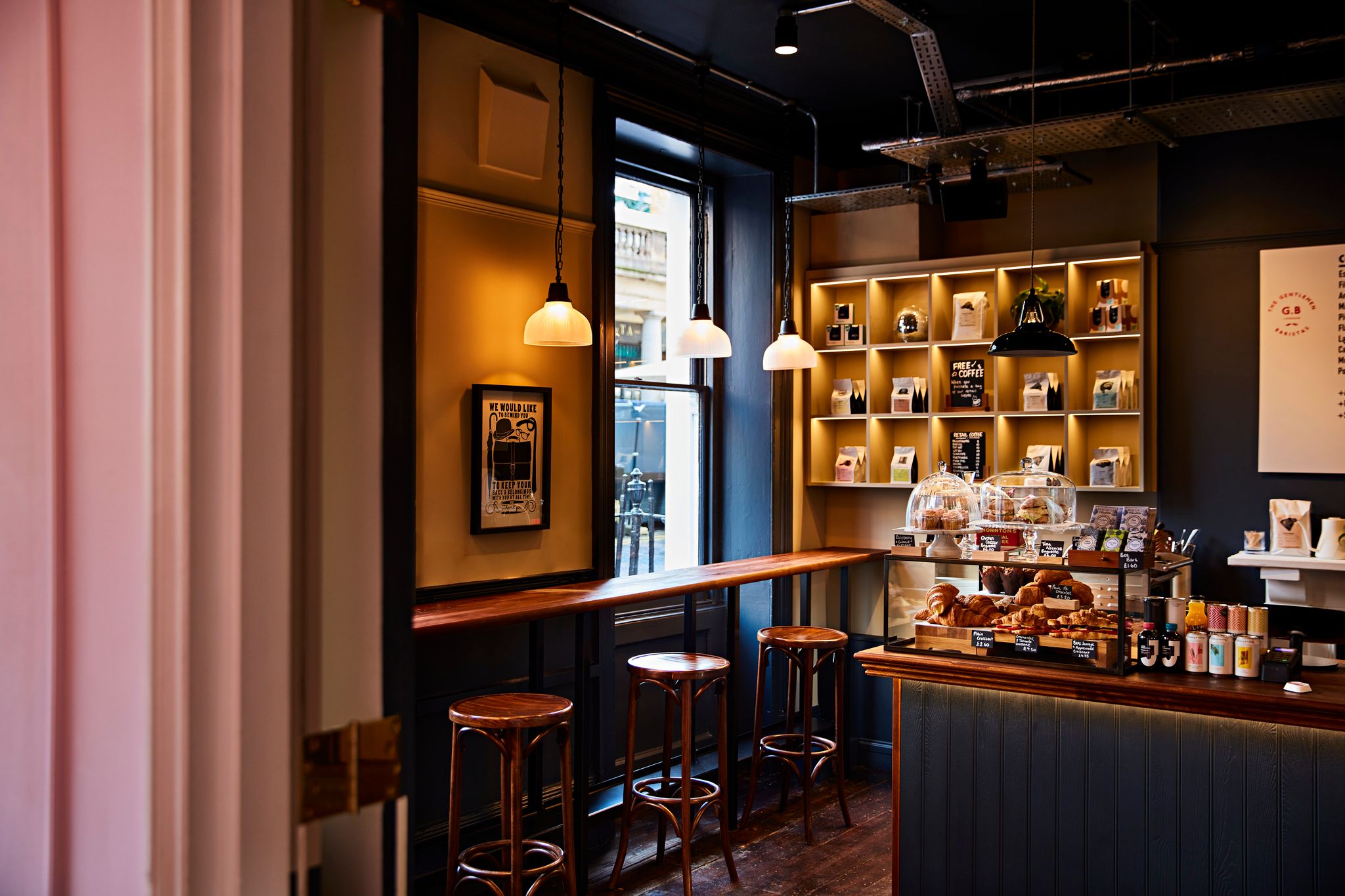 Stylish café with warm lighting, ideal for networking events and coffee breaks.