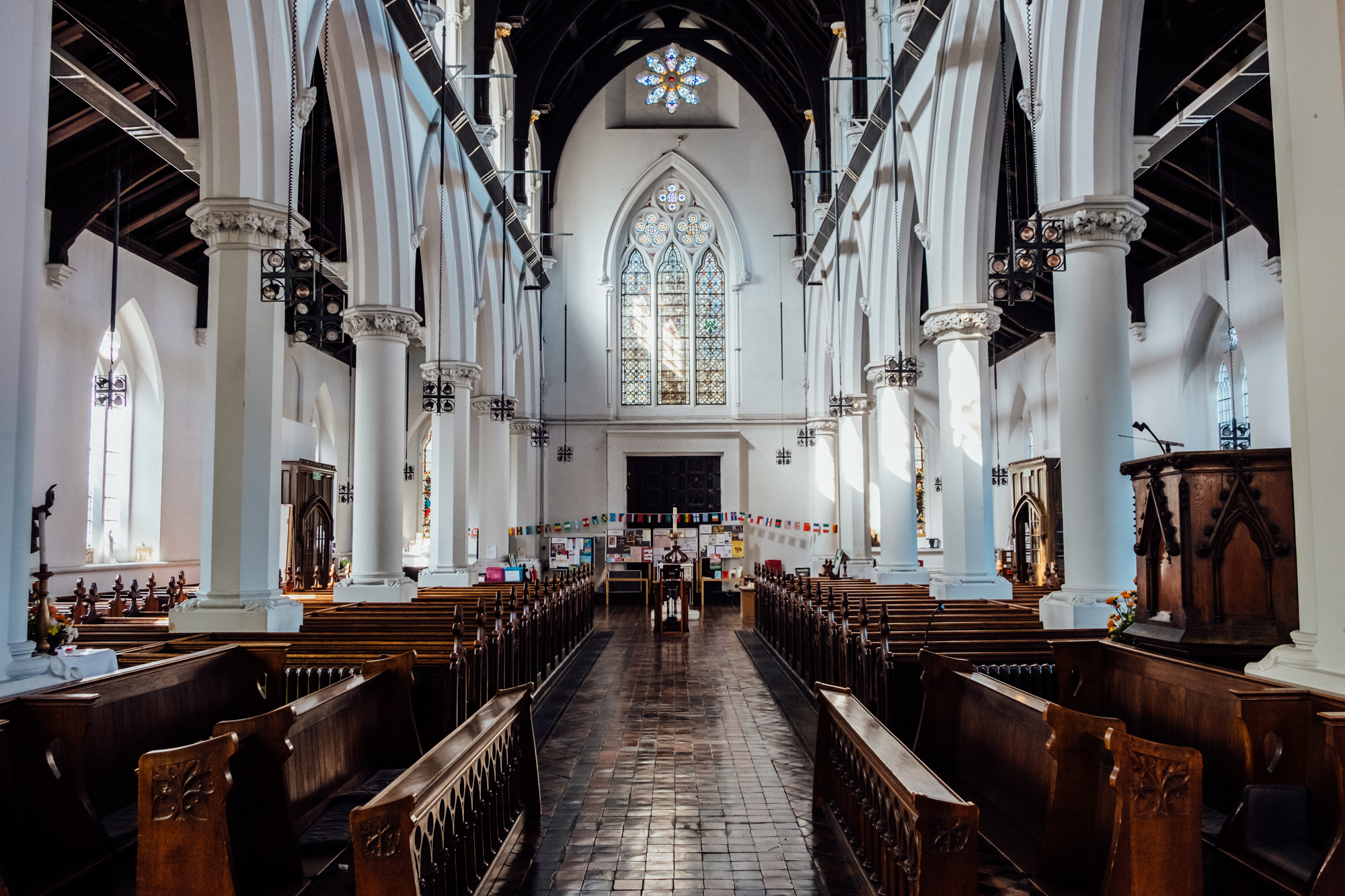 St Giles Camberwell church interior with stained glass, perfect for weddings and events.