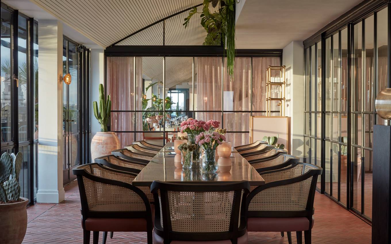 Rooftop Bar at One Hundred Shoreditch Hotel, elegant meeting space for exclusive events.