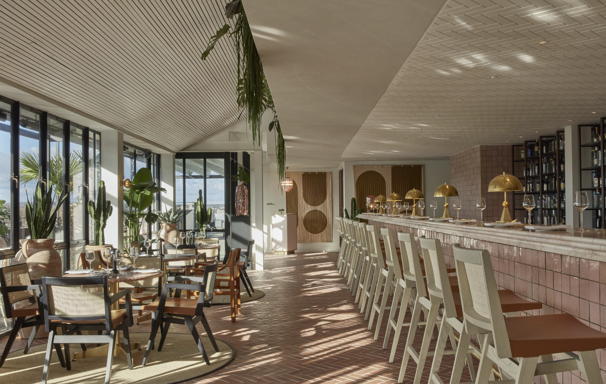 Rooftop Bar at One Hundred Shoreditch Hotel, modern event space with natural light, networking.