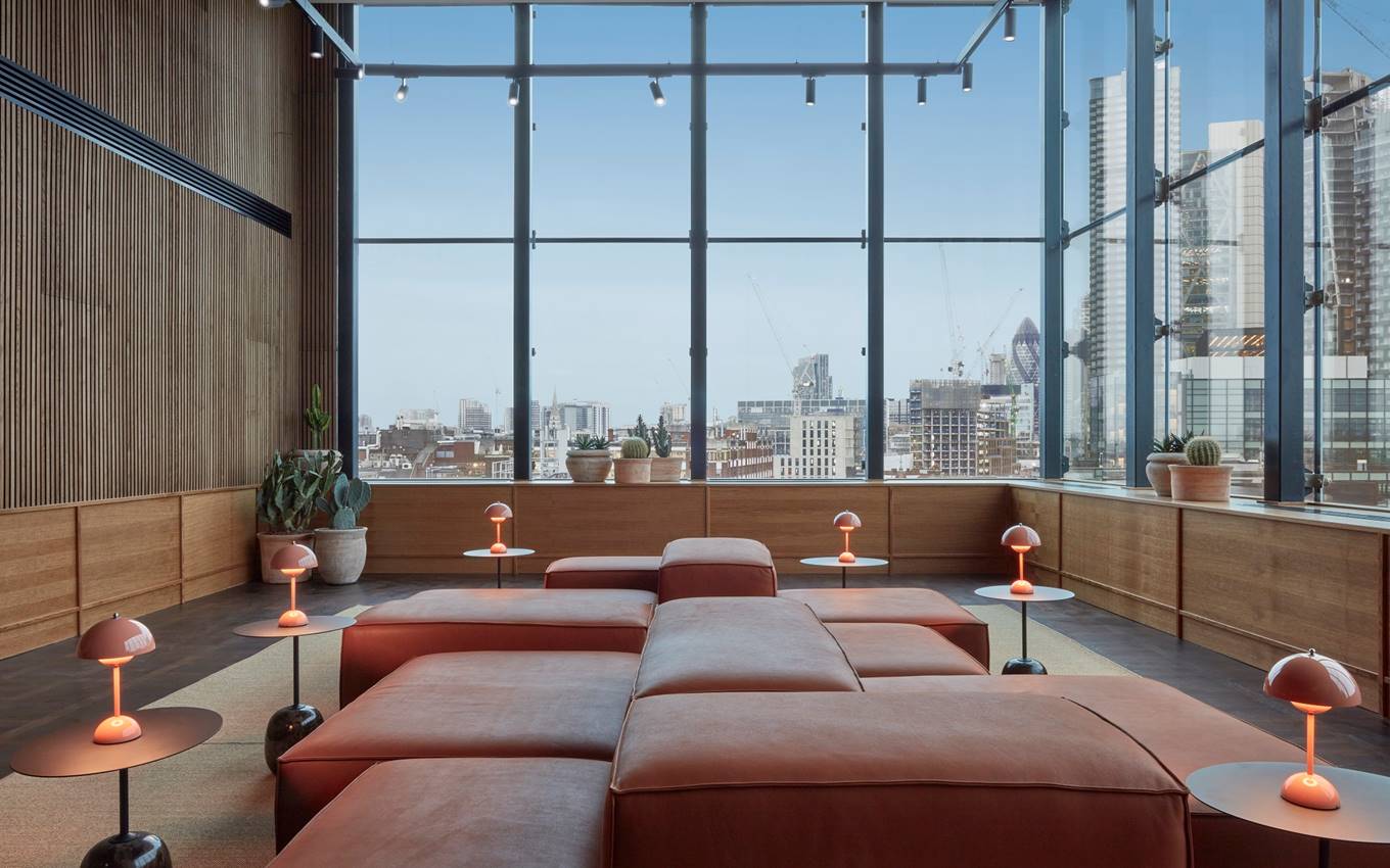 Modern meeting space with city views at One Hundred Shoreditch Hotel, ideal for gatherings.