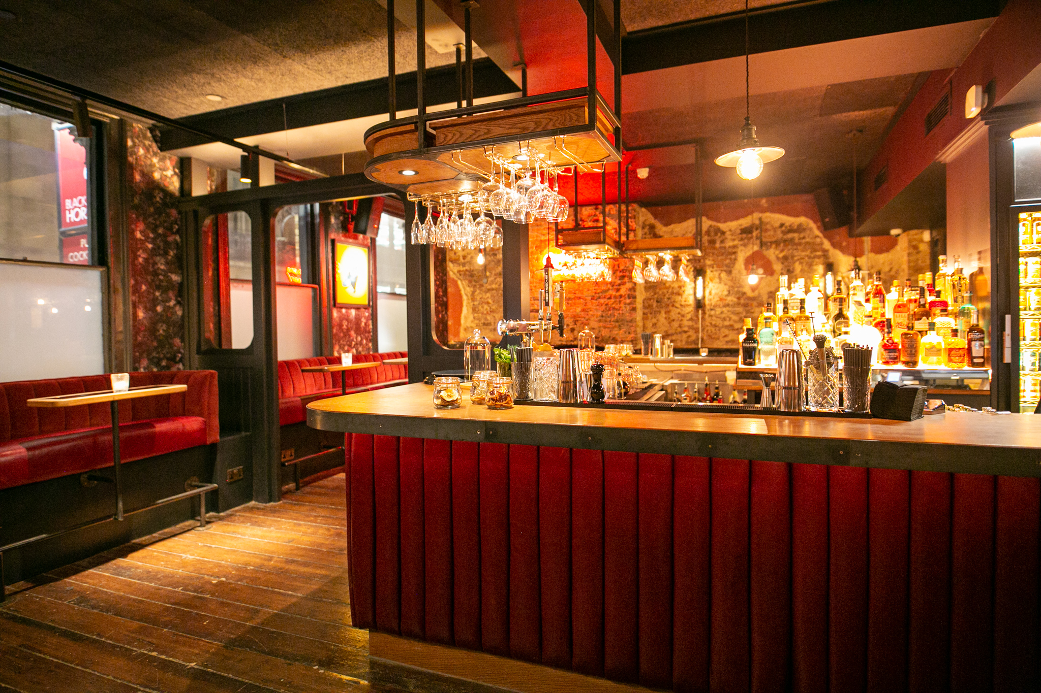 Stylish bar at Upstairs at The Black Horse, perfect for networking events and gatherings.