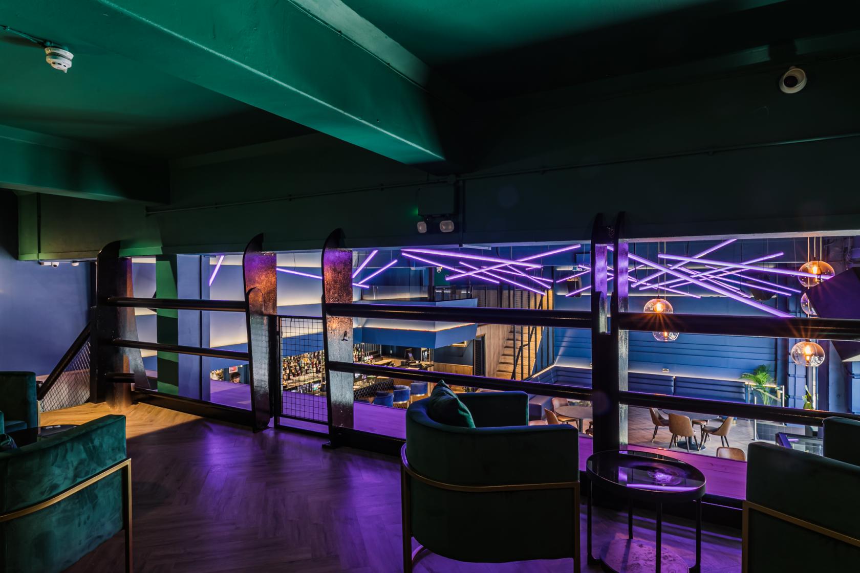 Modern event space The Mezzanine in Camden with vibrant lighting for meetings and gatherings.
