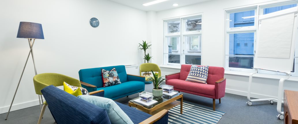 Modern lounge area with vibrant furniture for networking events in Wallacespace Covent Garden.