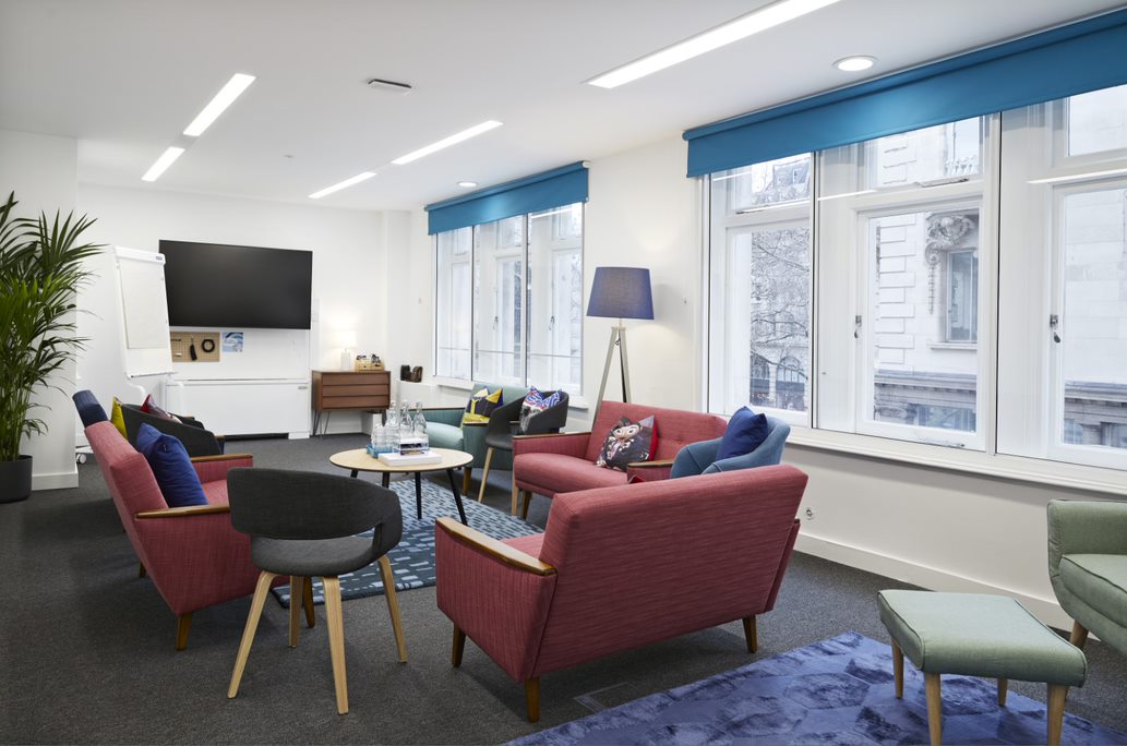 Modern meeting space in Wallacespace Covent Garden with colorful seating for collaboration.