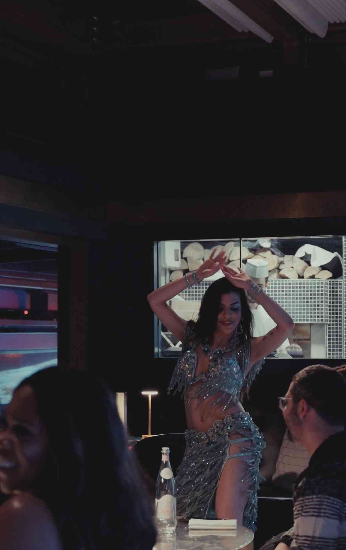 "Mezemiso Rooftop Restaurant performer in vibrant event setting, ideal for entertainment gatherings."