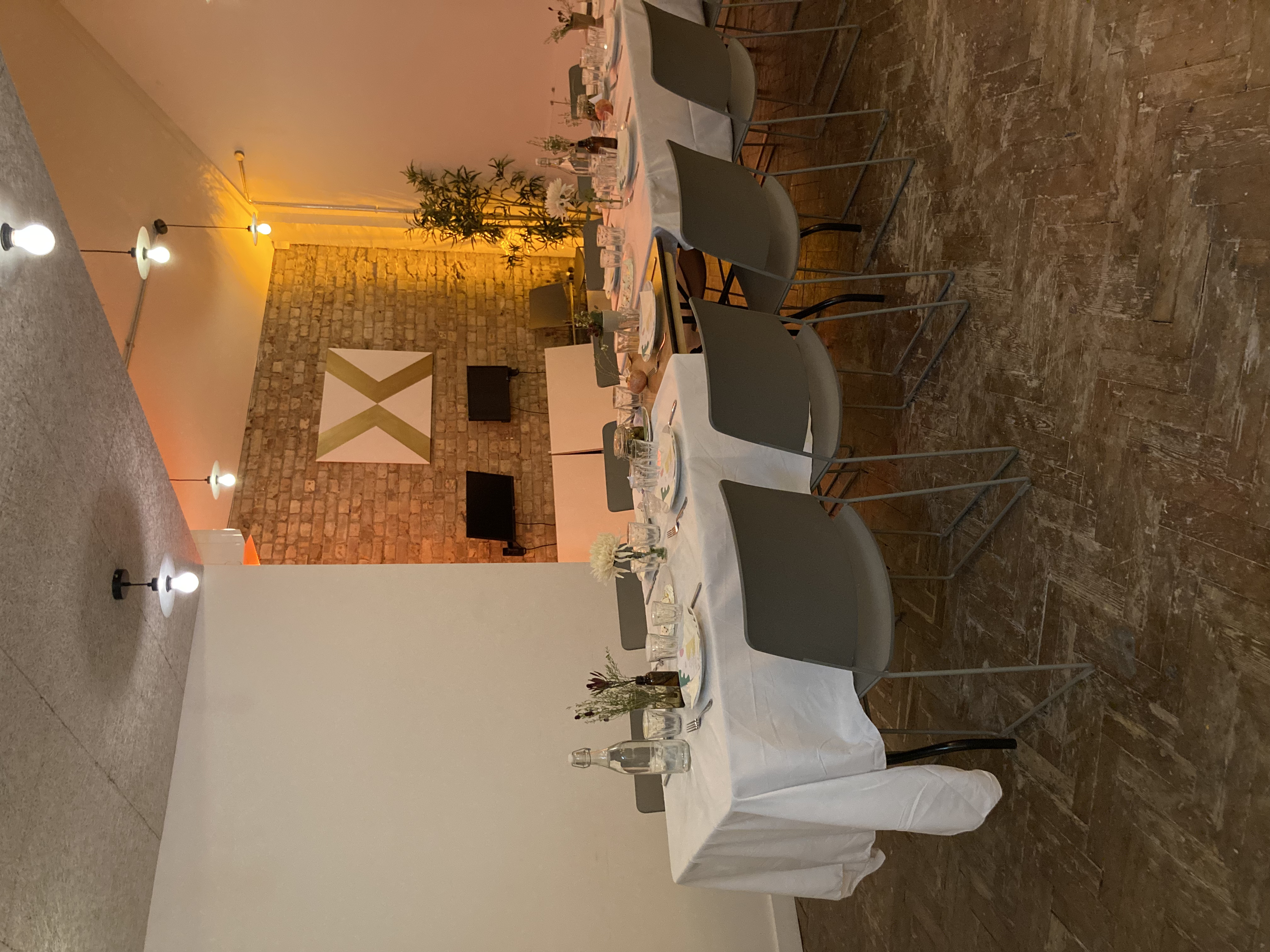 Private dining setup in King's House with elegant decor for meetings and events.