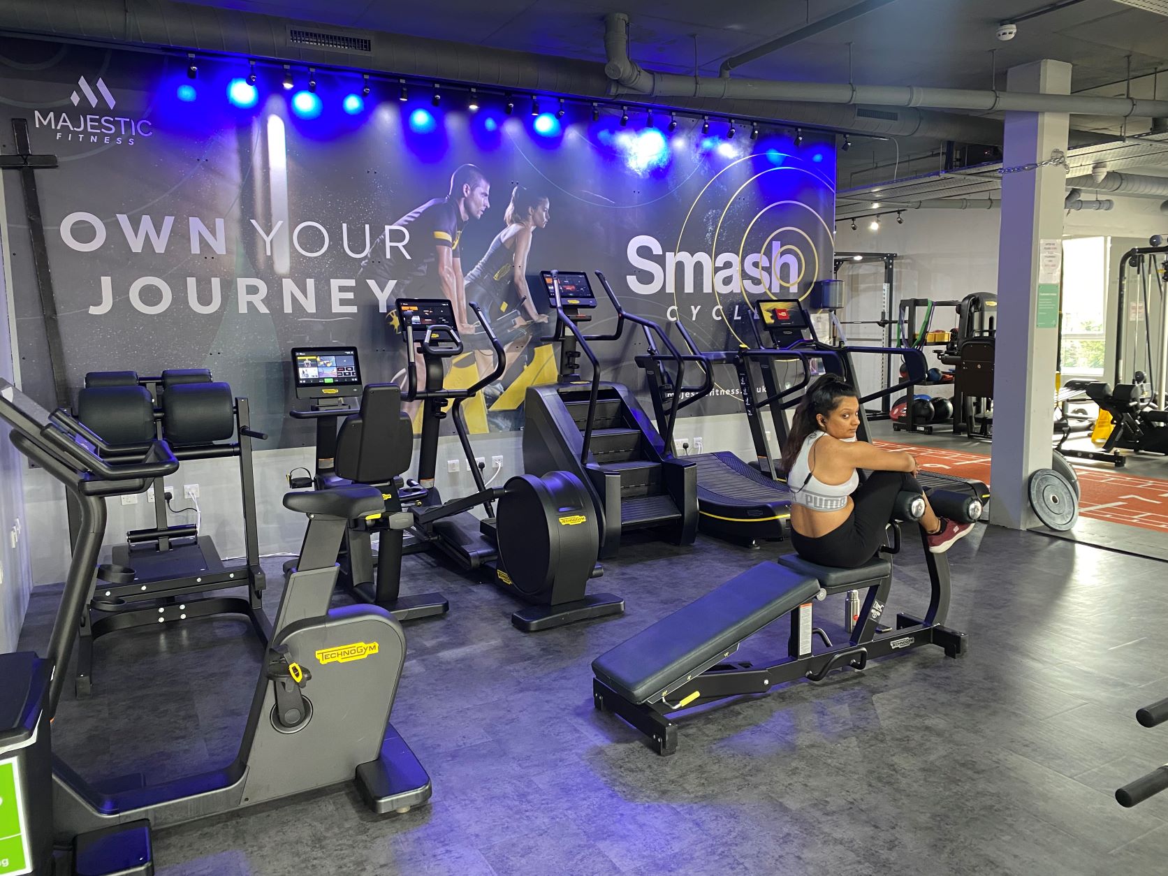 Modern gym with state-of-the-art equipment for wellness events and team-building activities.