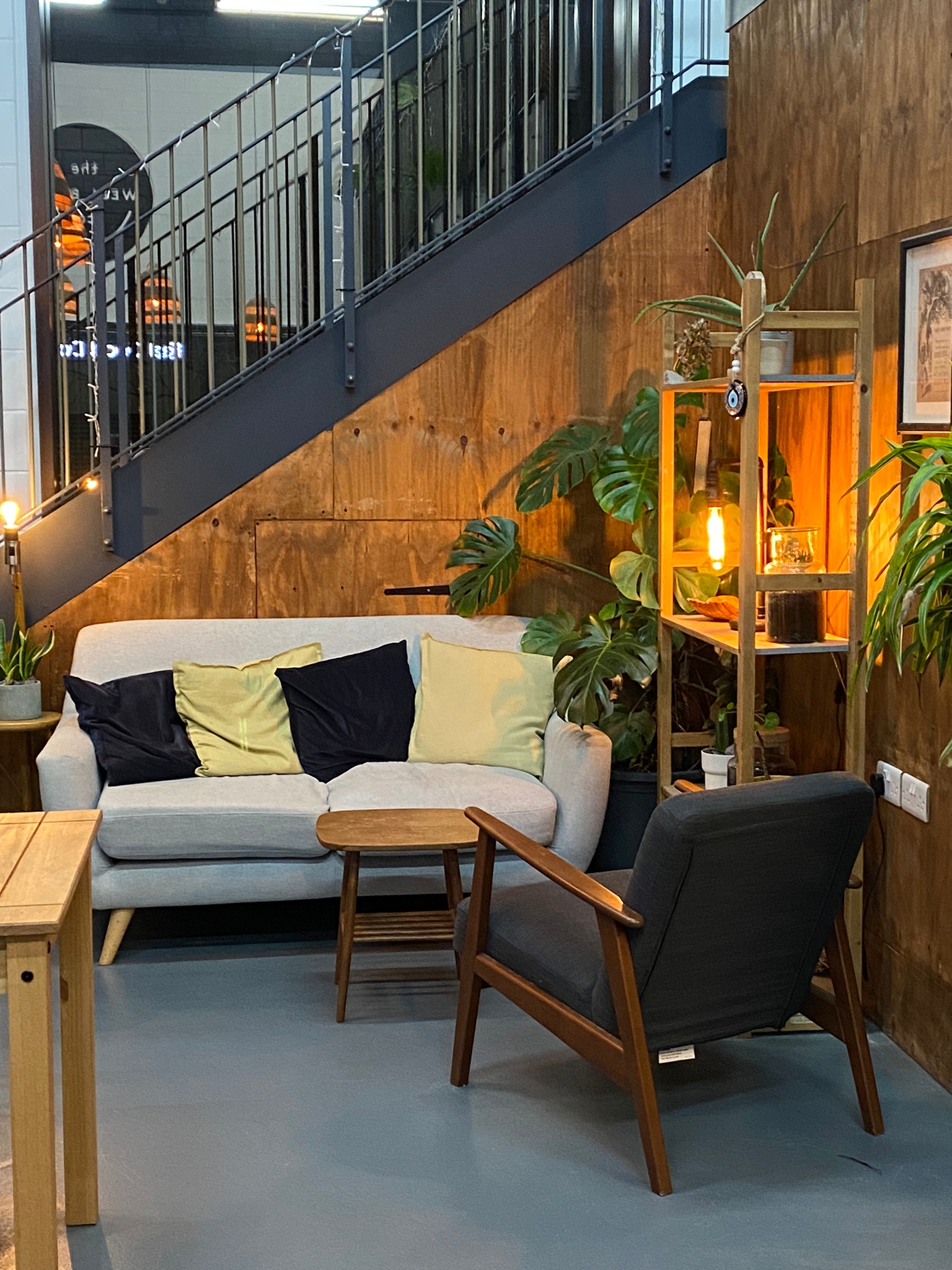 Cozy meeting space at Royal Albert Wharf with soft seating for creative gatherings.
