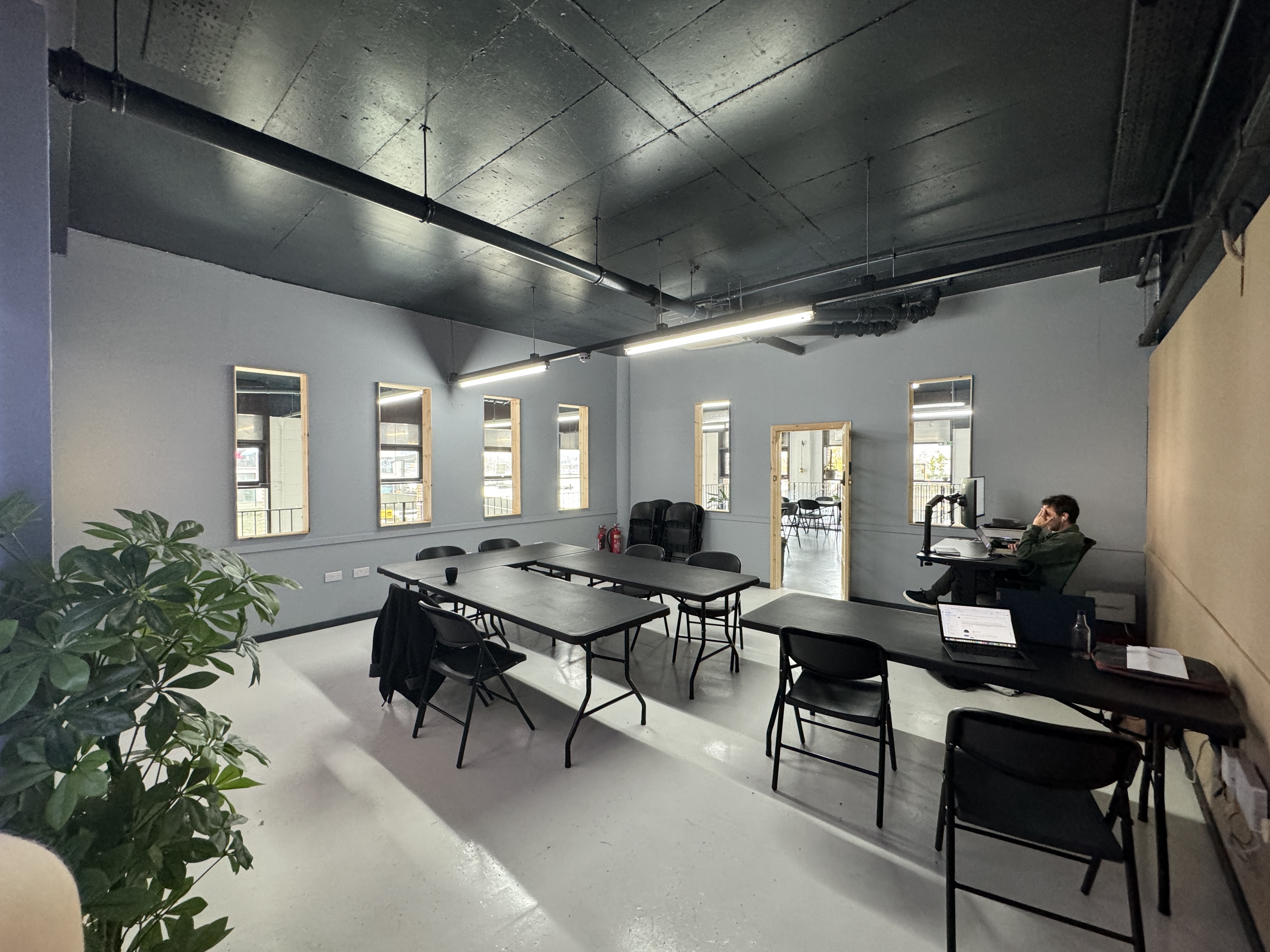 Versatile meeting space at Royal Albert Wharf, ideal for workshops and team meetings.