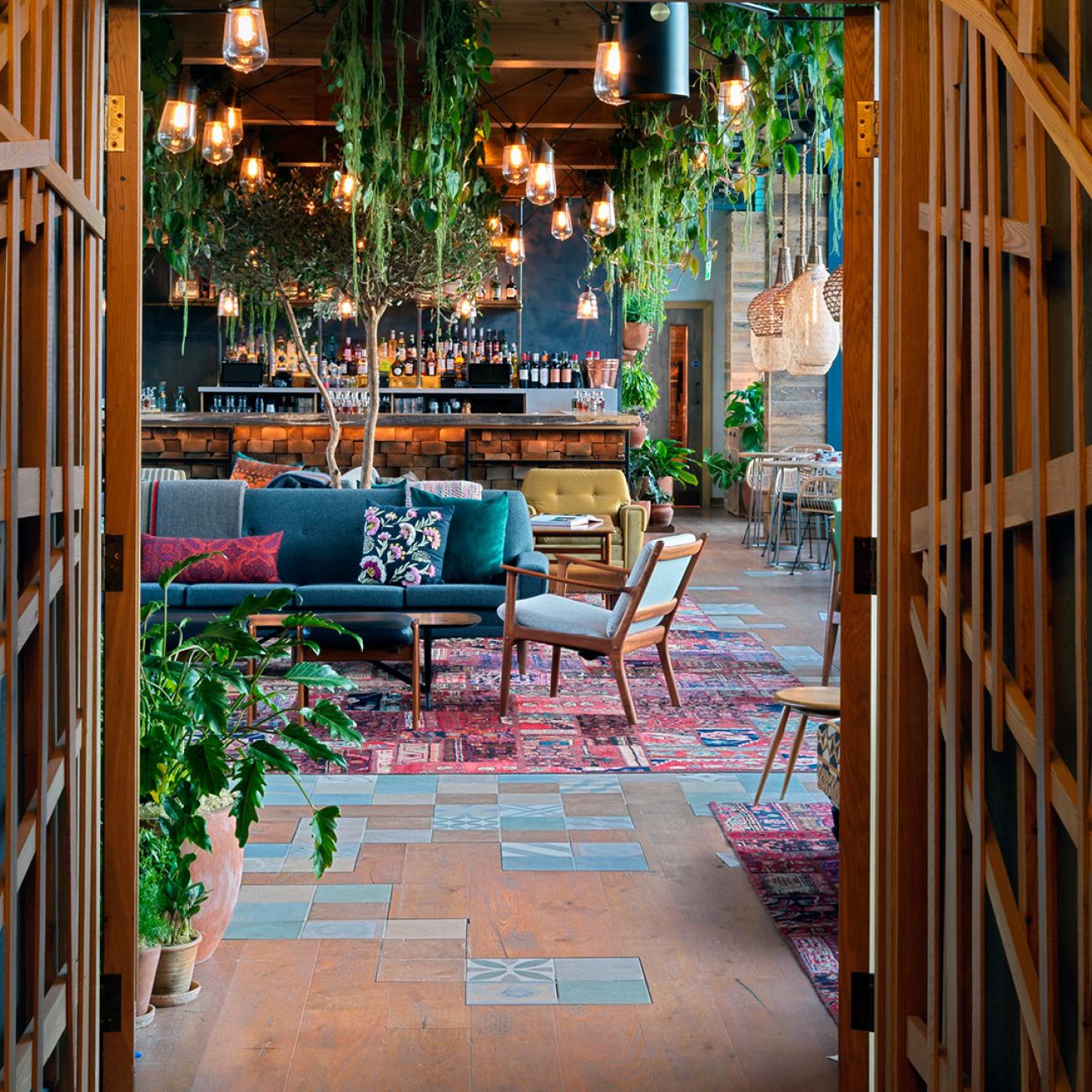 Vibrant Treehouse event space with cozy seating, ideal for networking and gatherings.