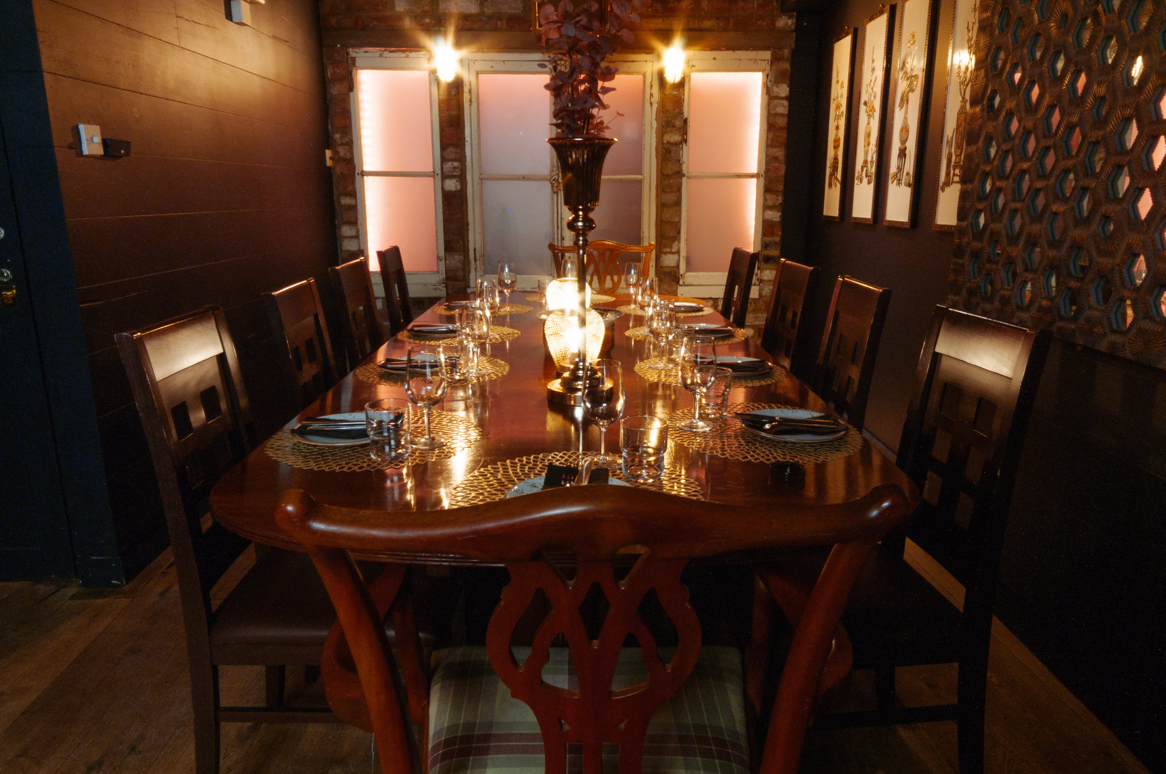 Elegant dining table in The Zen Den, perfect for intimate gatherings and corporate dinners.