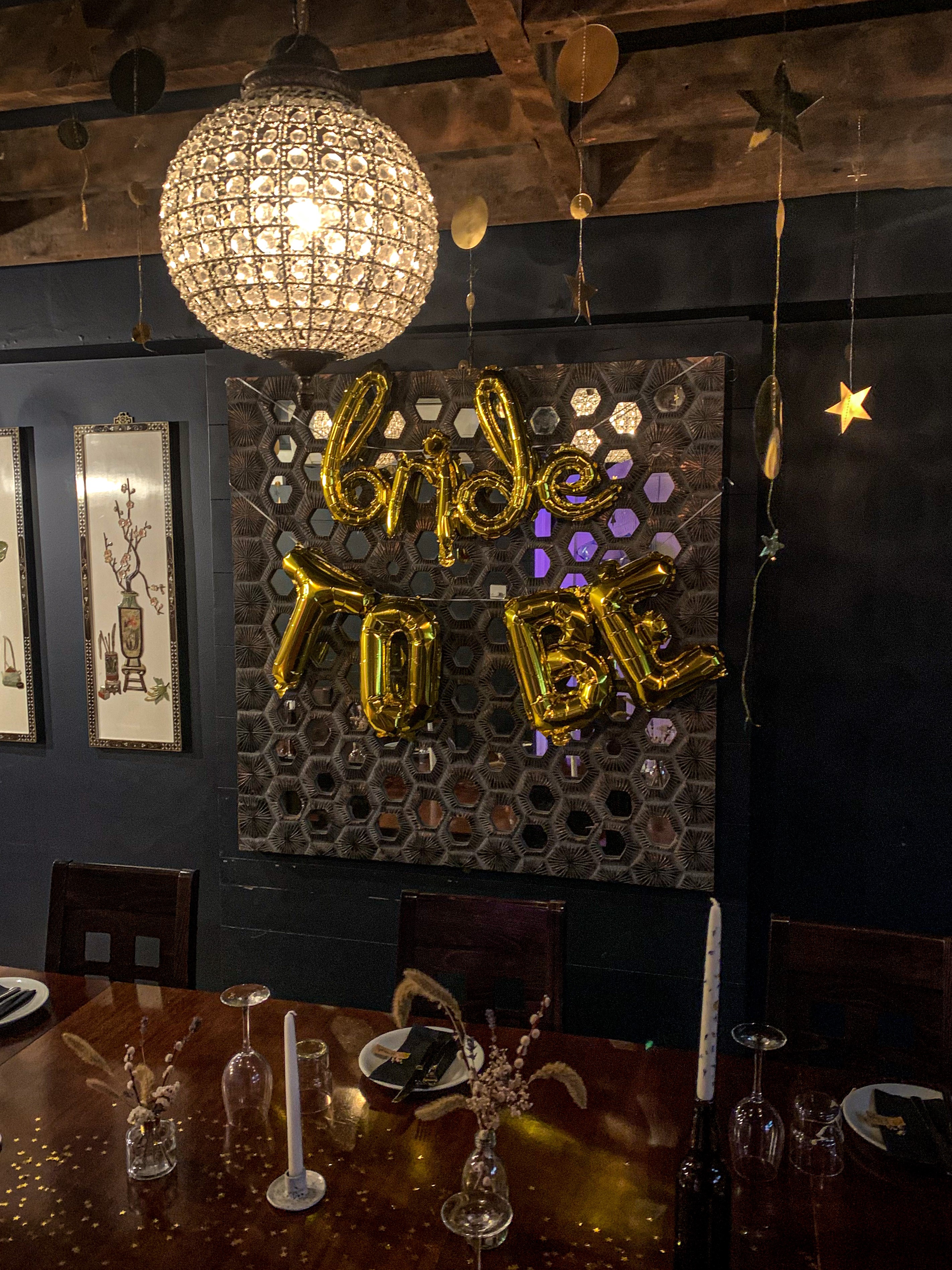 "Charming bridal shower setup with gold 'Bride to Be' balloons in The Zen Den."