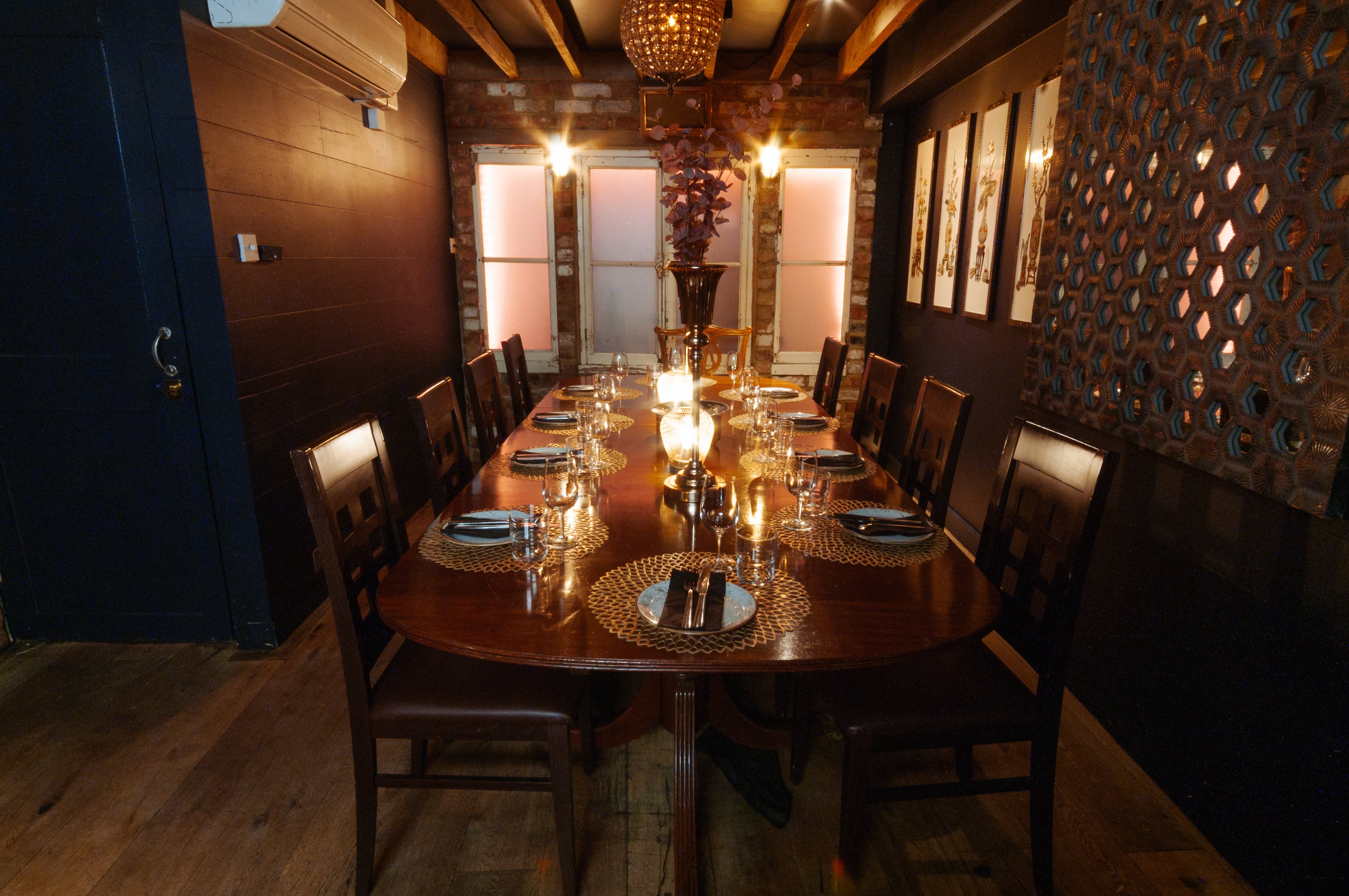 Elegant dining table in The Zen Den, perfect for intimate gatherings and corporate dinners.