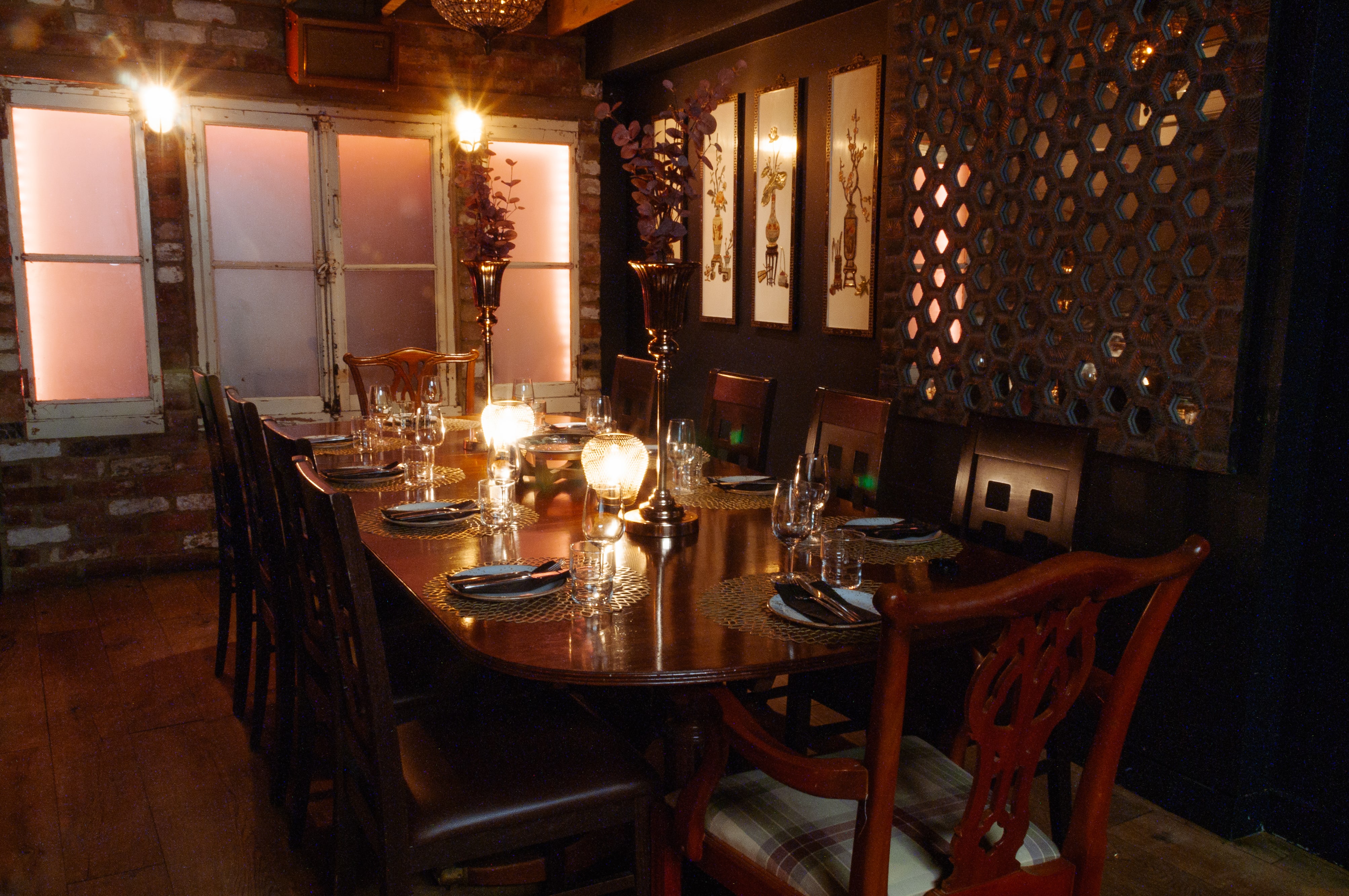 Elegant dining table in The Zen Den, perfect for intimate gatherings and corporate dinners.