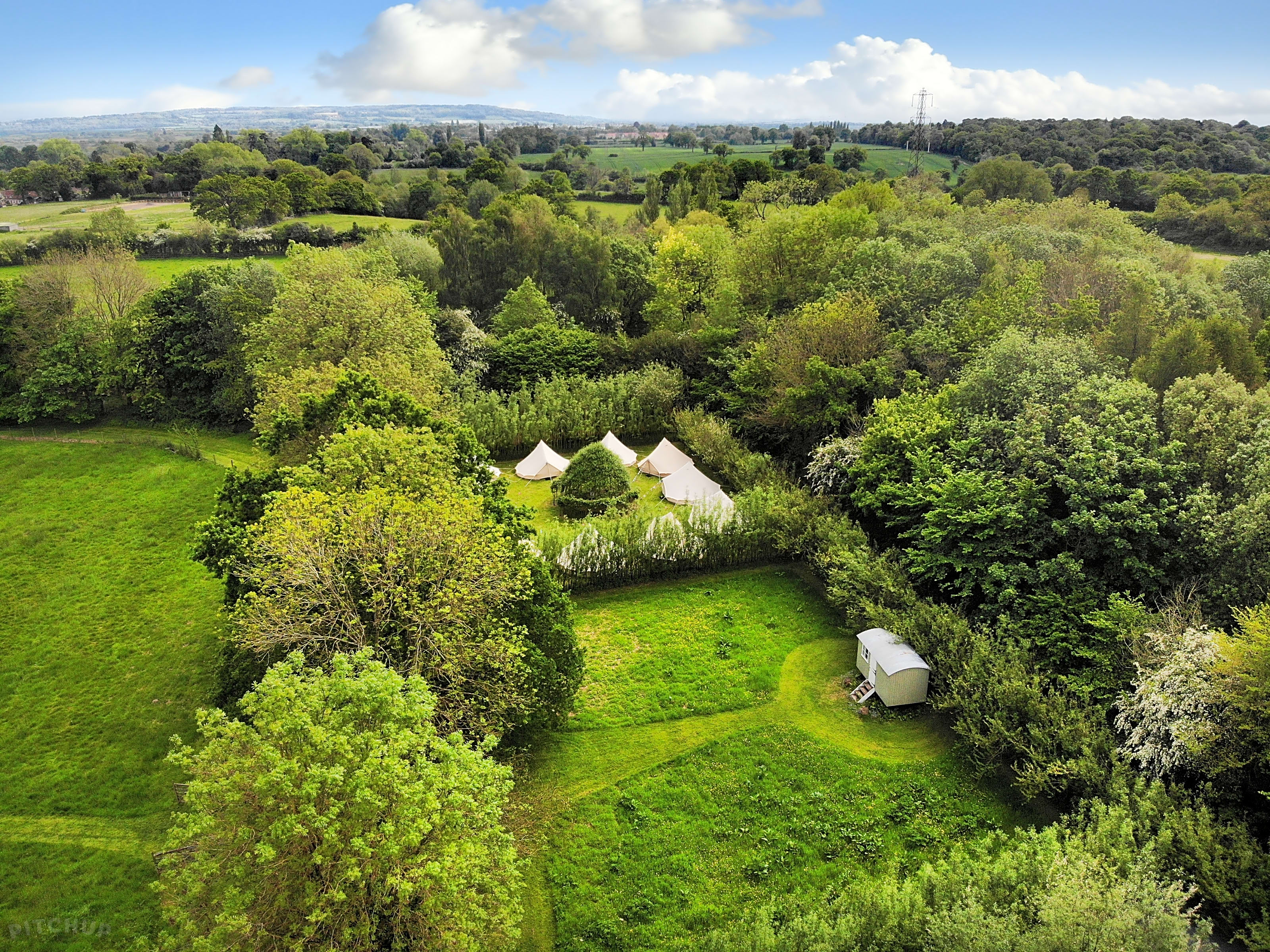 Serene glamping venue in Church Farm Estate, perfect for retreats and team-building events.
