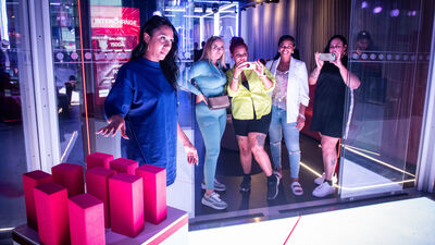 CUBE + Putters event with attendees enjoying immersive activities in Urban Playground.