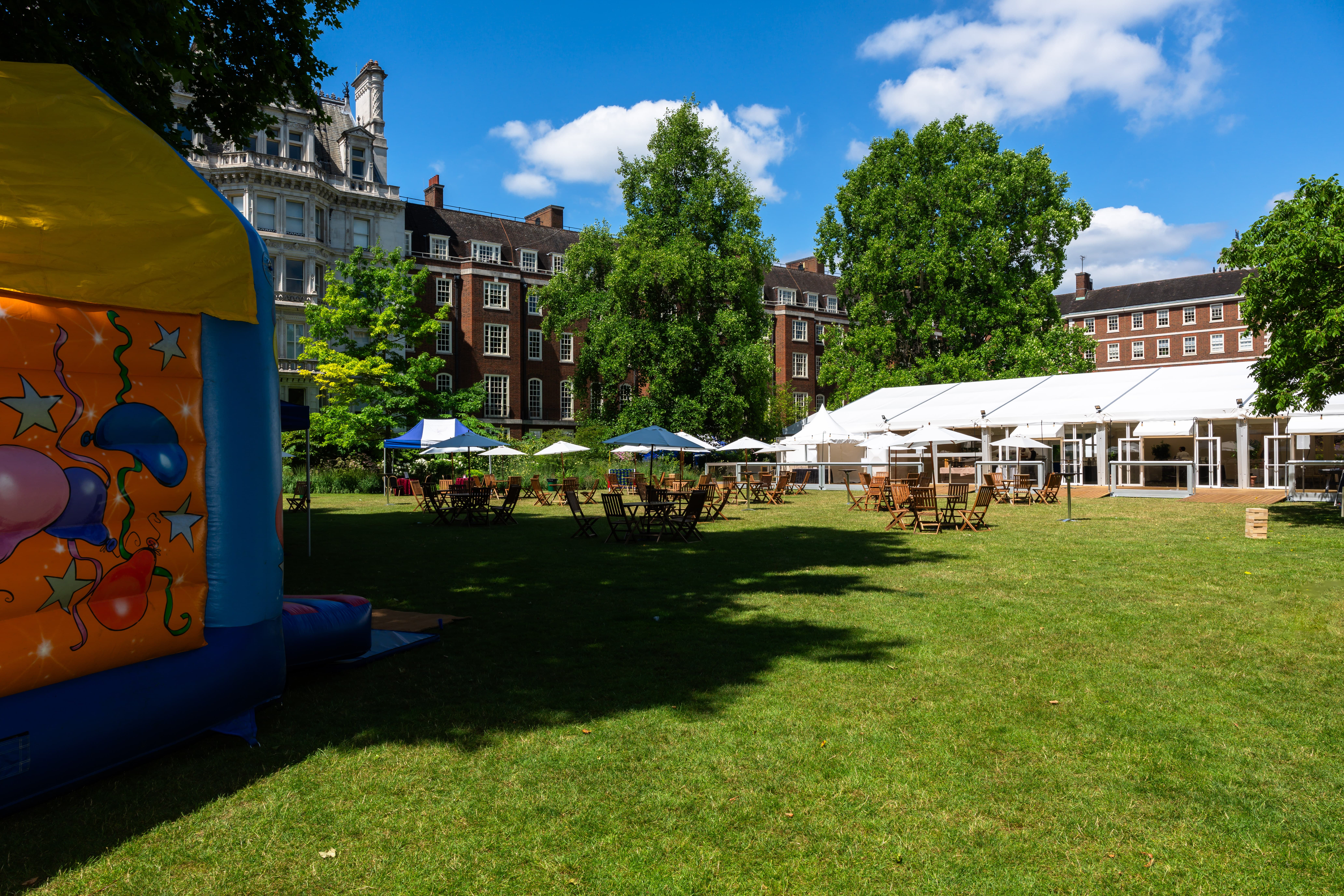 The Garden at Inner Temple with marquee and seating for corporate family days and summer festivals.