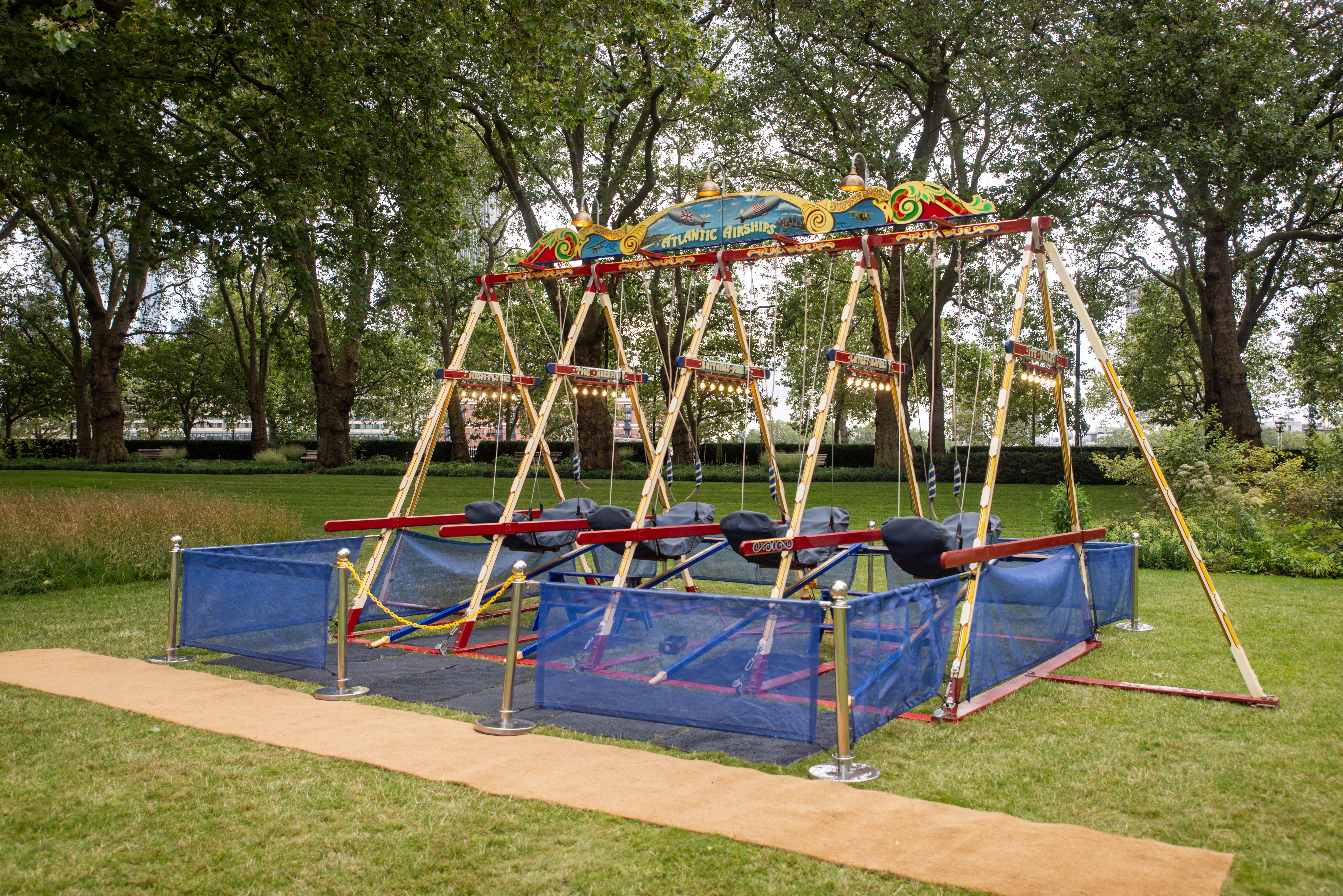 Vintage swing ride at The Inner Temple, perfect for experiential corporate retreats and festivals.