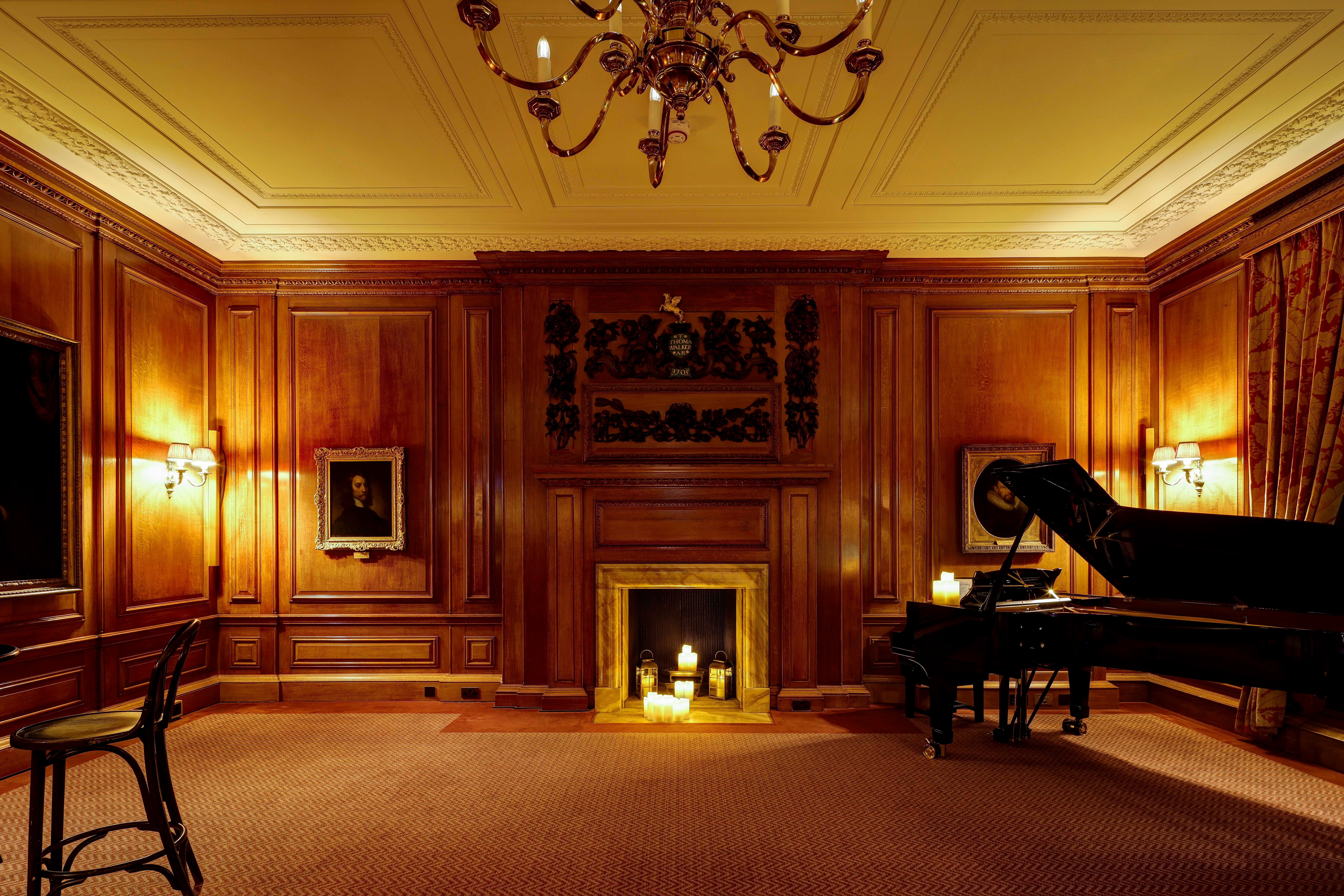 Parliament Chamber wood-paneled room for exclusive C-suite dinner and historic corporate event.