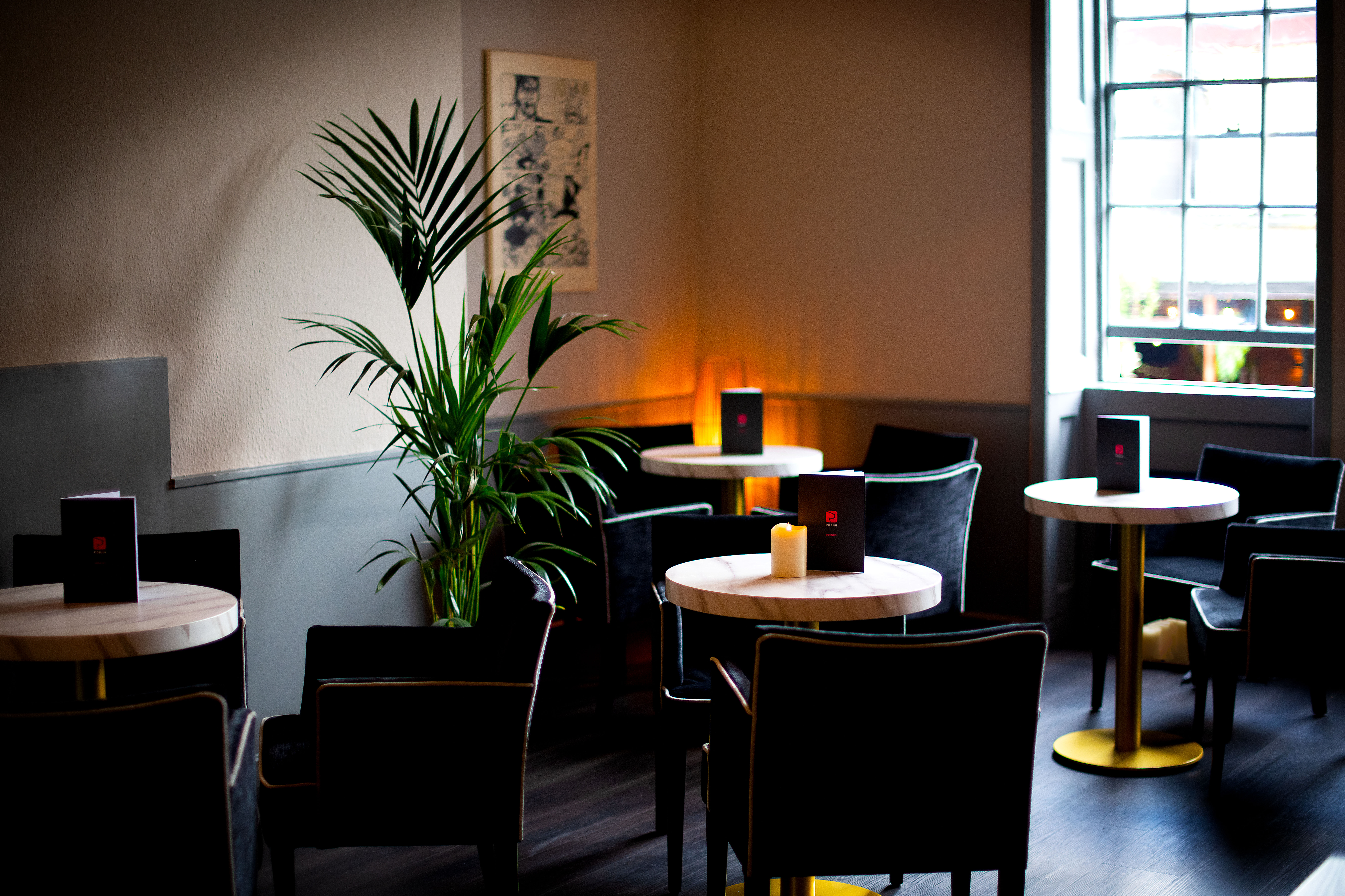 Intimate Kanagaki Suite meeting space with warm lighting, ideal for networking events.