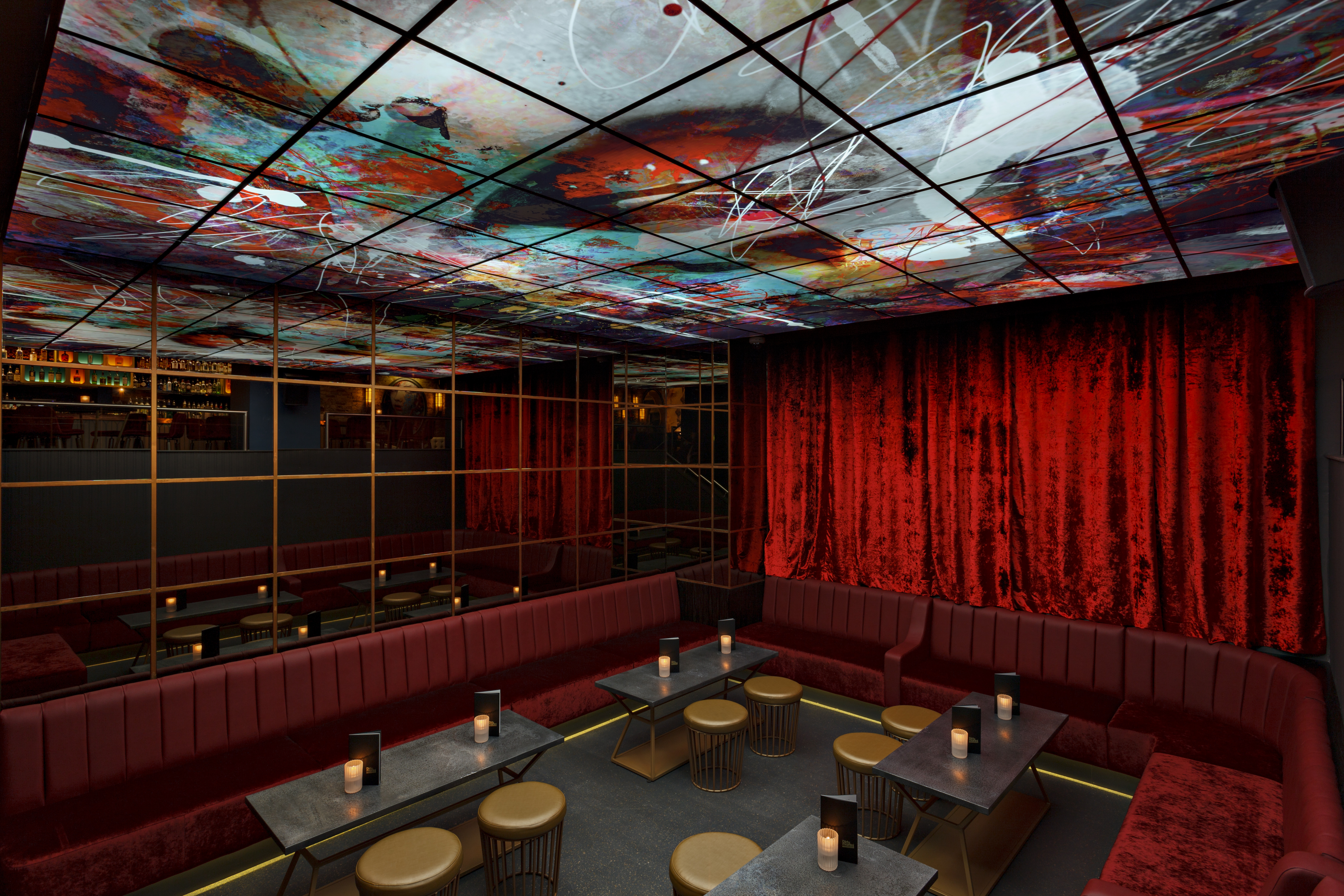 Stylish event space at Dirty Martini St Paul's with plush seating, ideal for gatherings.