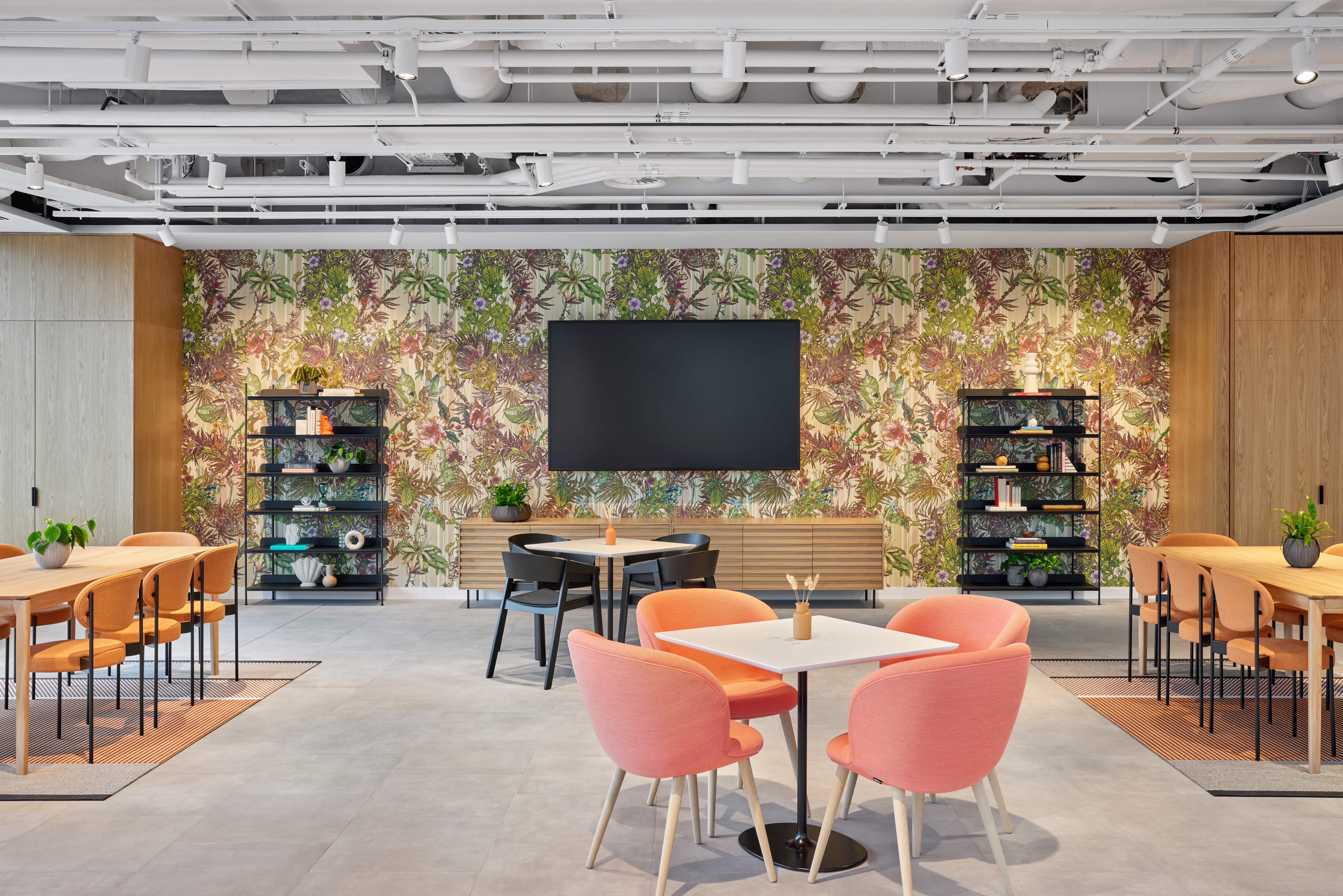 Modern meeting space with floral wallpaper for events and presentations at Convene 22 Bishopsgate.
