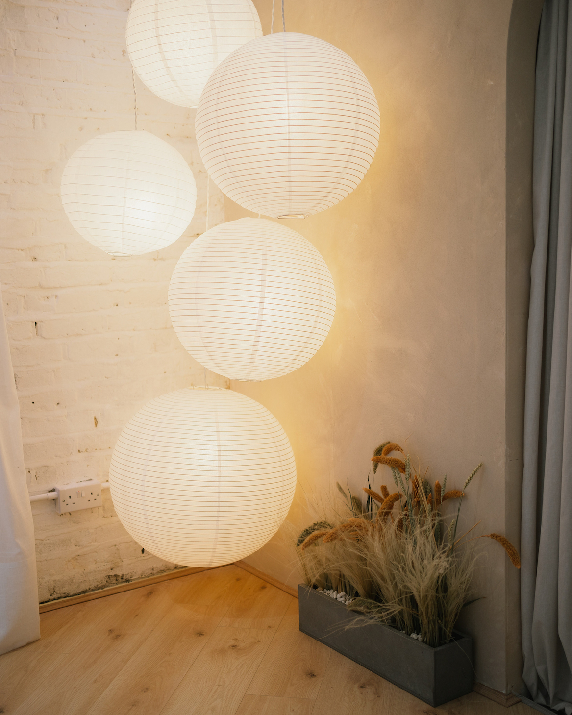 Stylish event space with elegant lanterns for intimate gatherings and networking.