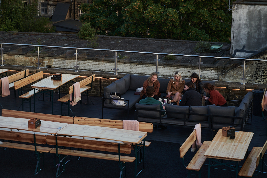 Dalston Roofpark rooftop event space with lounge seating, ideal for casual gatherings.