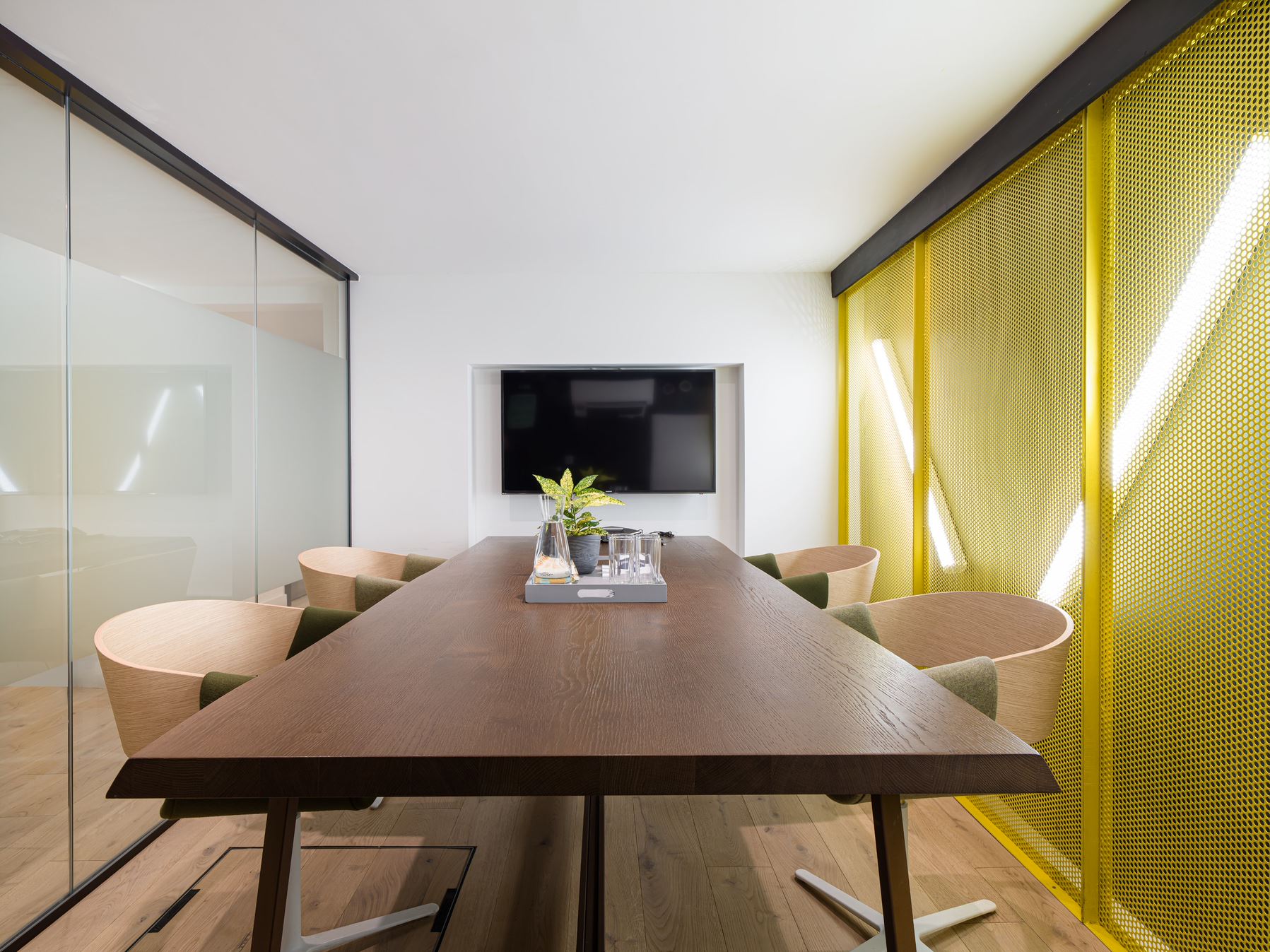 Modern Meeting Room 4 at Uncommon Highbury for collaborative sessions with glass walls.