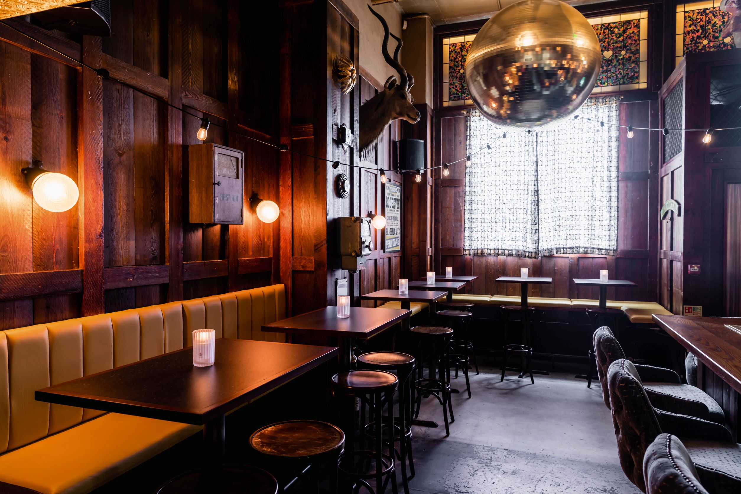 Stylish venue with warm wood, ideal for cocktail receptions and networking events.