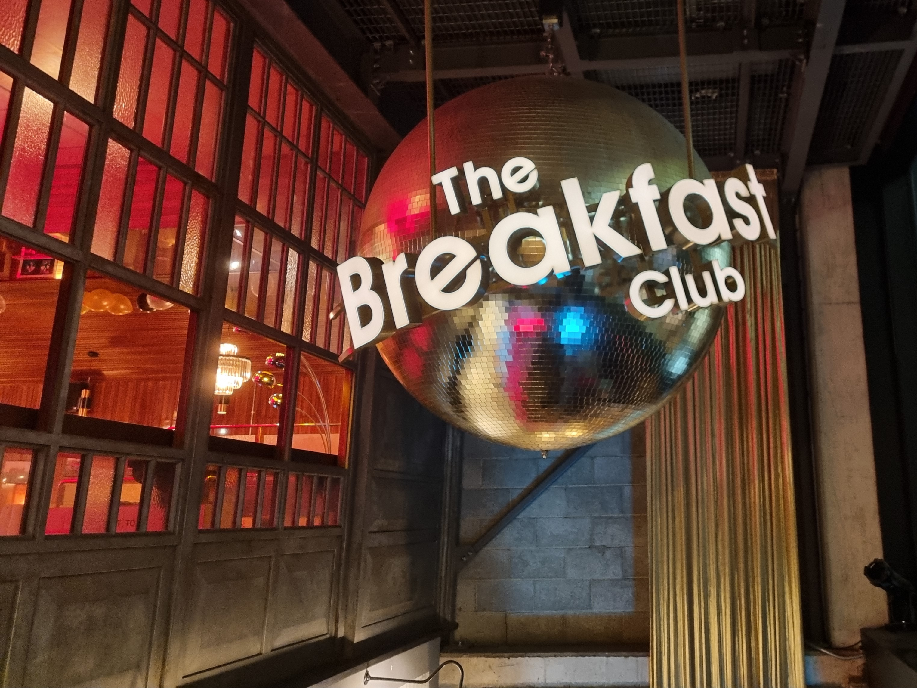 Vibrant venue with disco ball at The Breakfast Club, ideal for creative meetings and events.