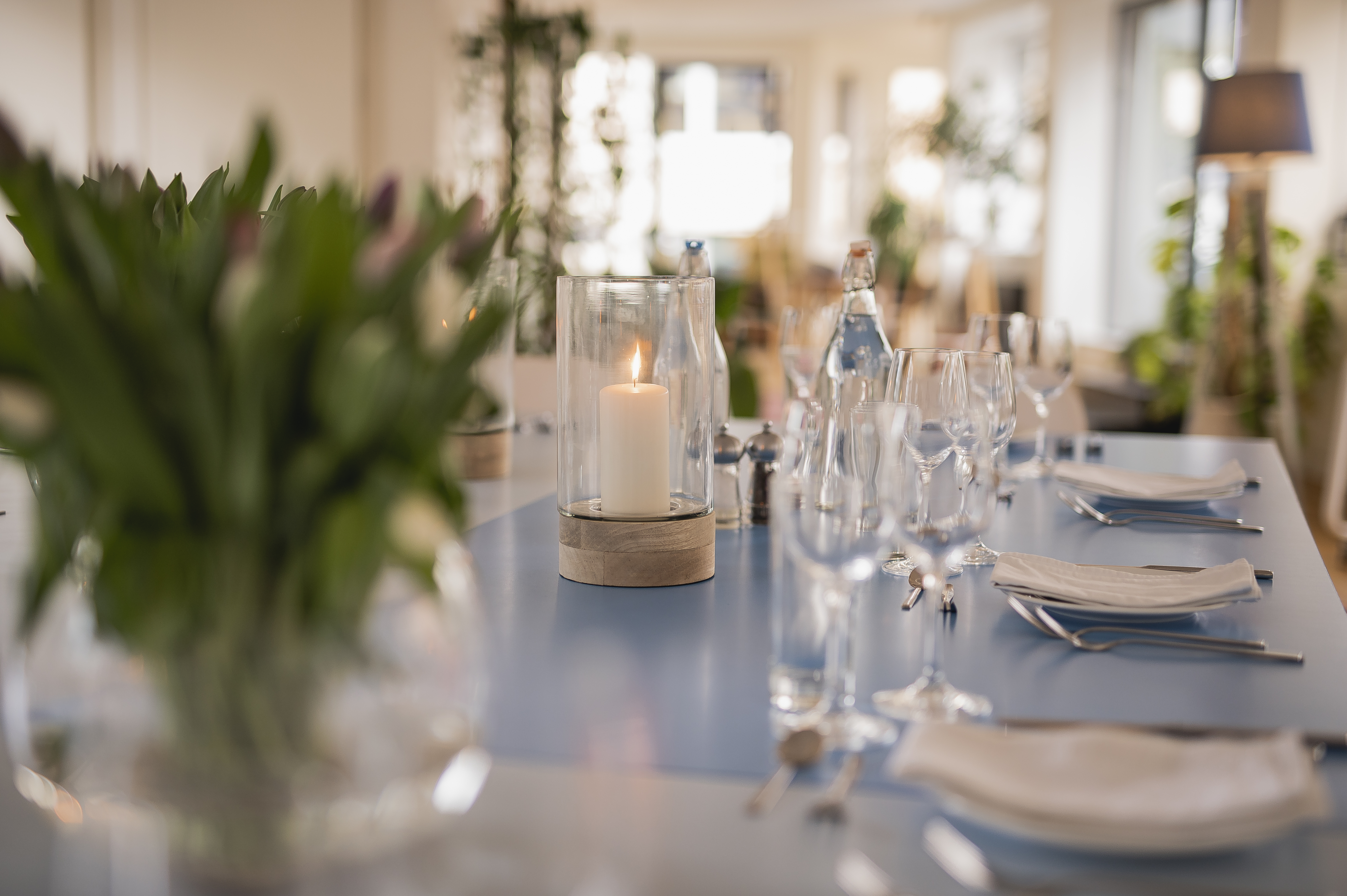 Elegant dining table with flowers at Clerkenwell Kitchen for corporate events.