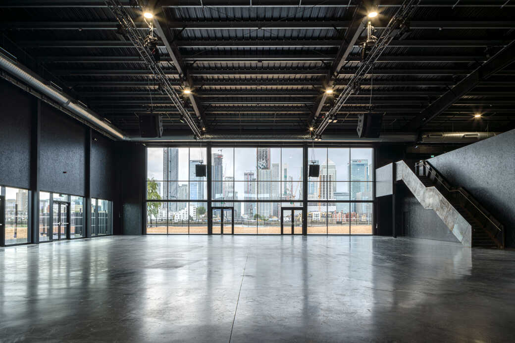Industrial-chic venue in EH Woolwich with skyline views for corporate activations and gala events.
