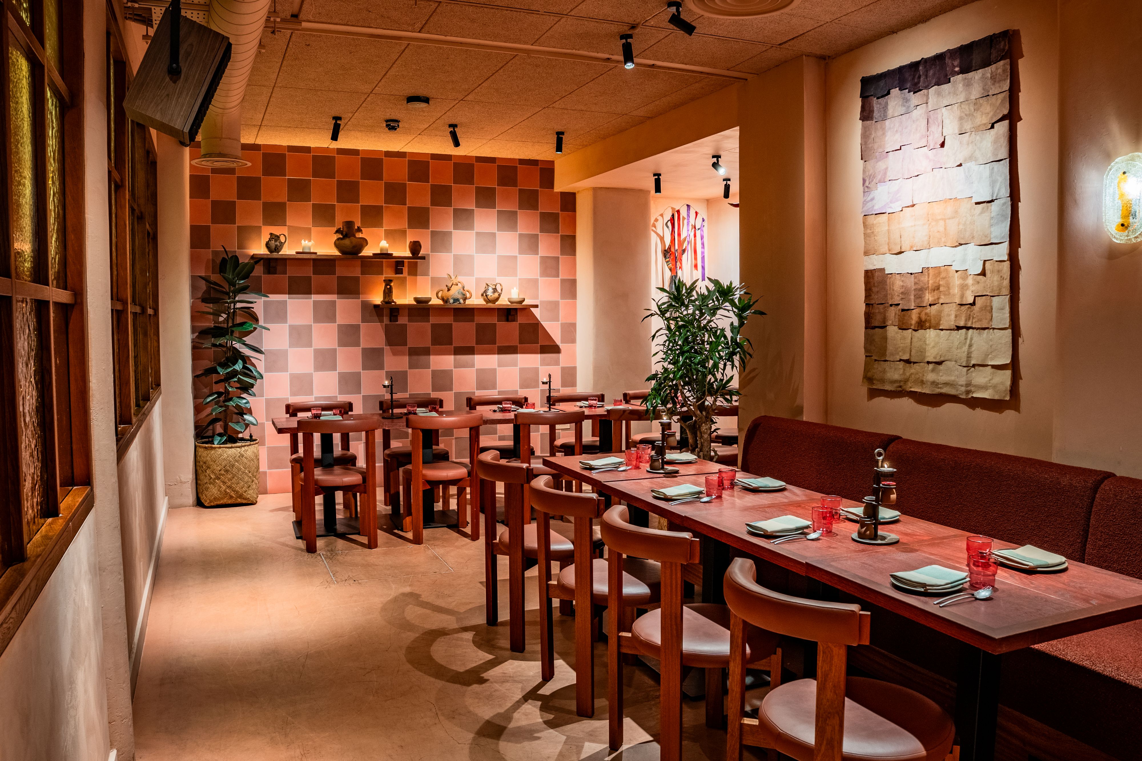 Intimate Sala Rosa Room in Fonda, featuring warm colors for gatherings and celebrations.