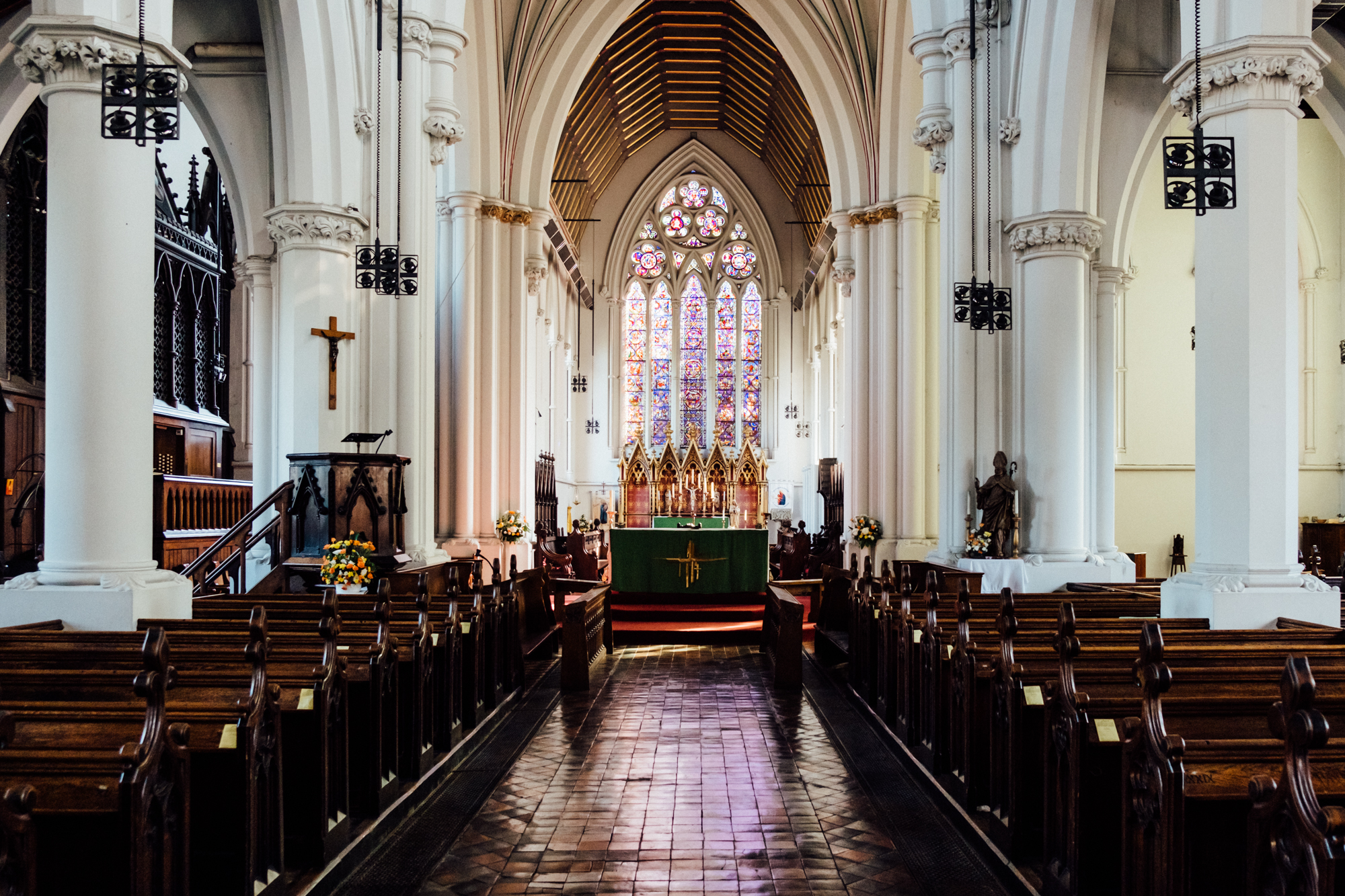 St Giles Church interior with stained glass, ideal for unique ceremonies and gatherings